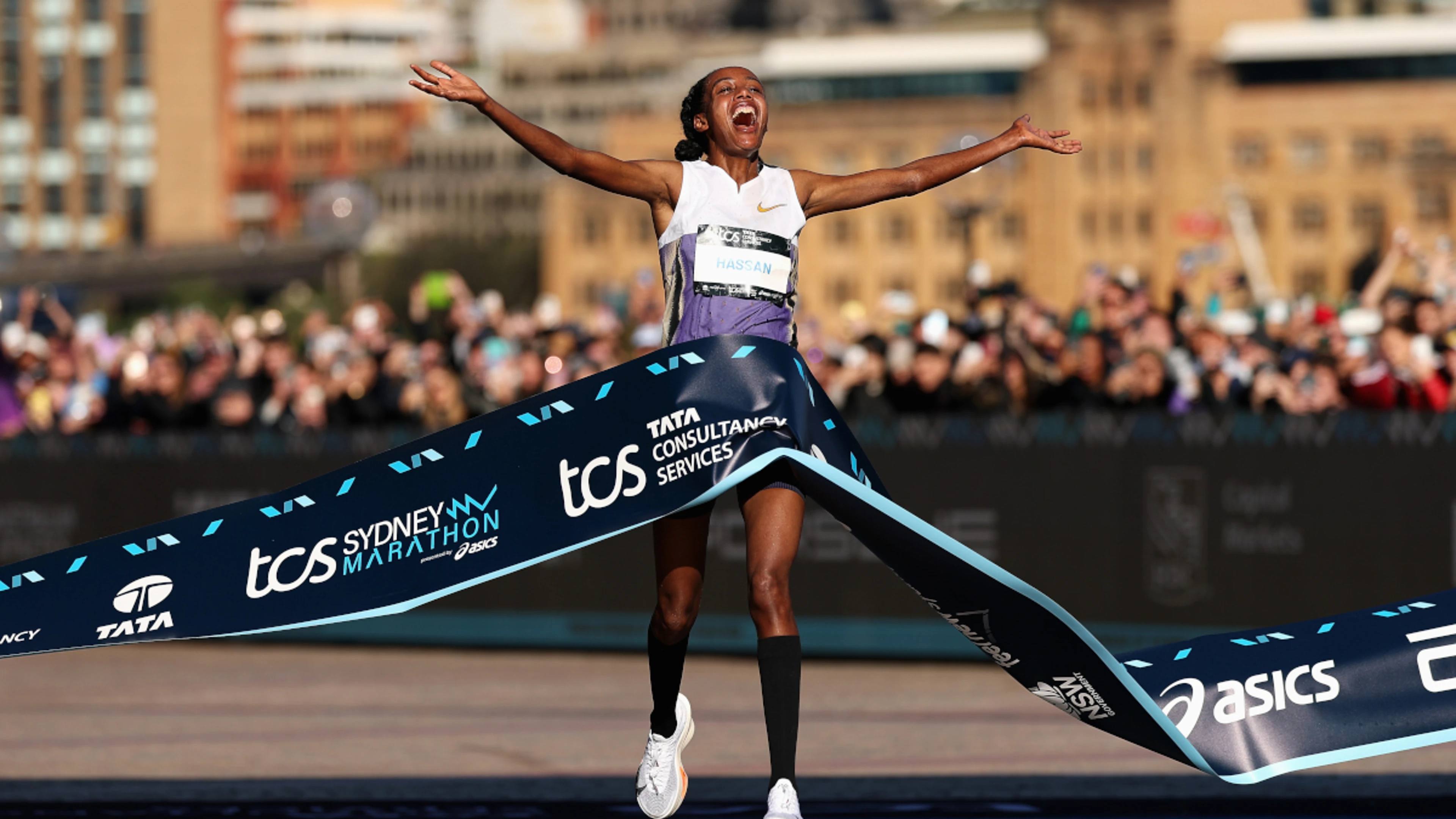 Hassan and Kiros smash course records to win Sydney Marathon