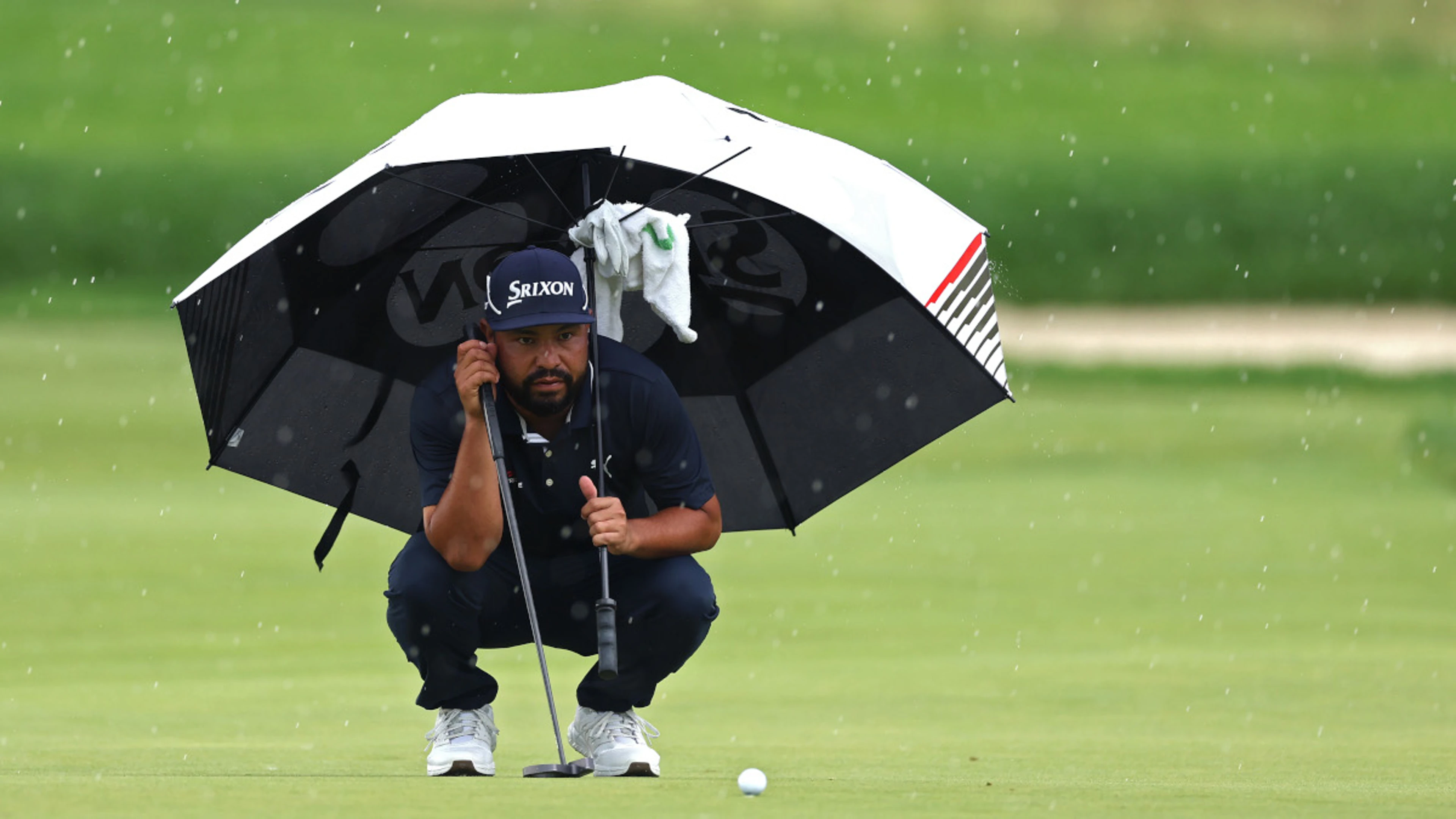 Heavy rain halts final round of US Open at soaked Oakmont