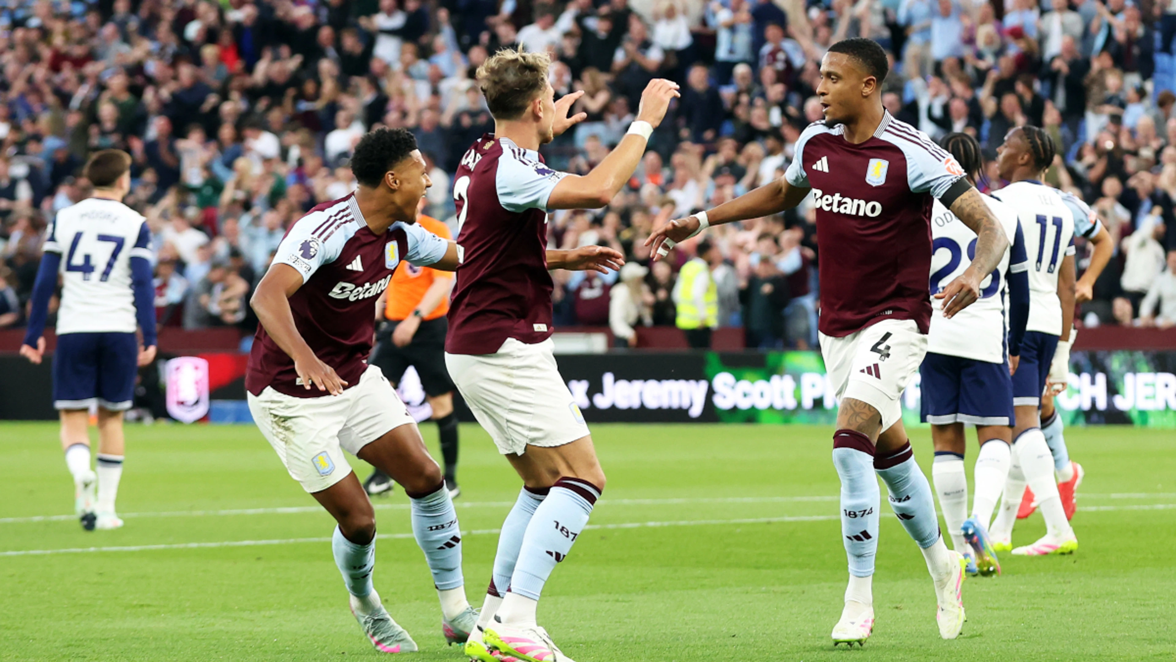 Villa sink Spurs to bolster bid to reach Champions League