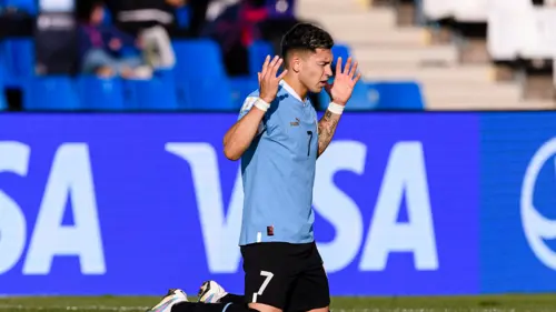Gonzalez penalty fires Uruguay through
