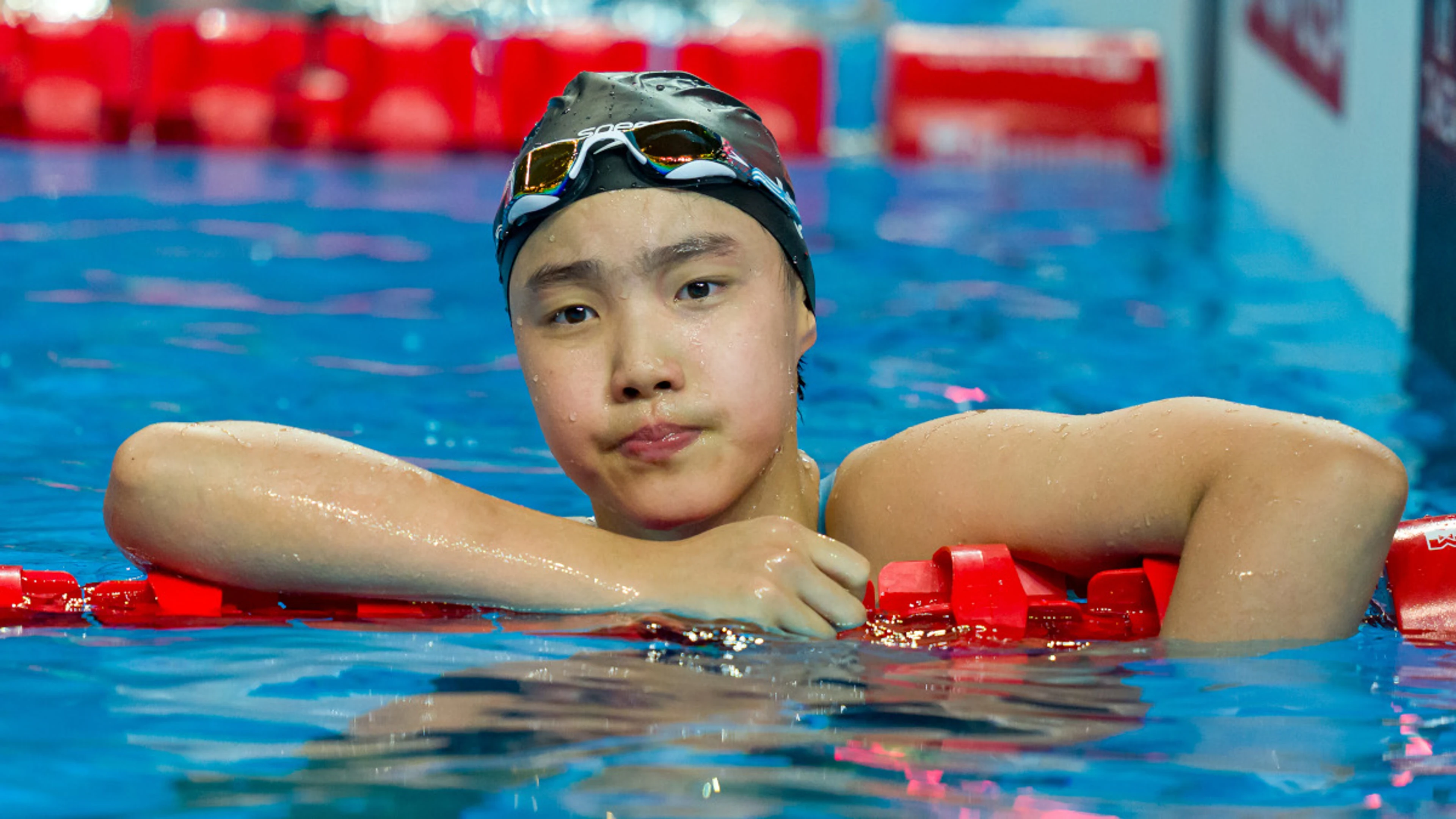 'Emotional' Yu, 12, celebrates historic world swimming medal