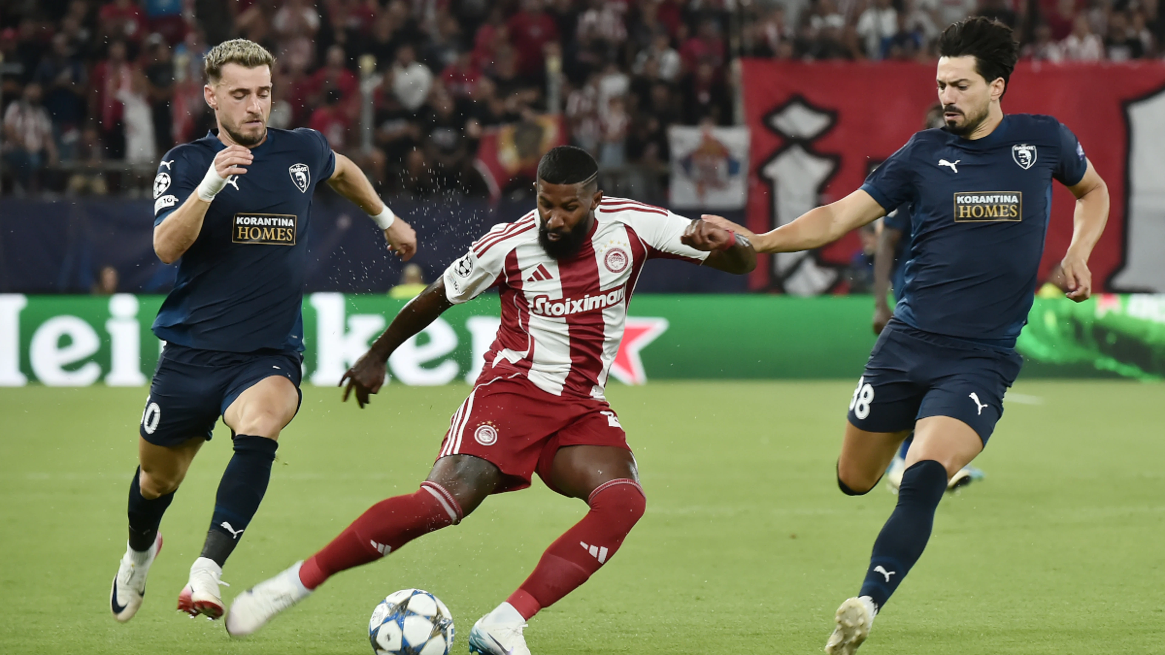 Olympiakos frustrated as 10-man Pafos hold out for goalless draw