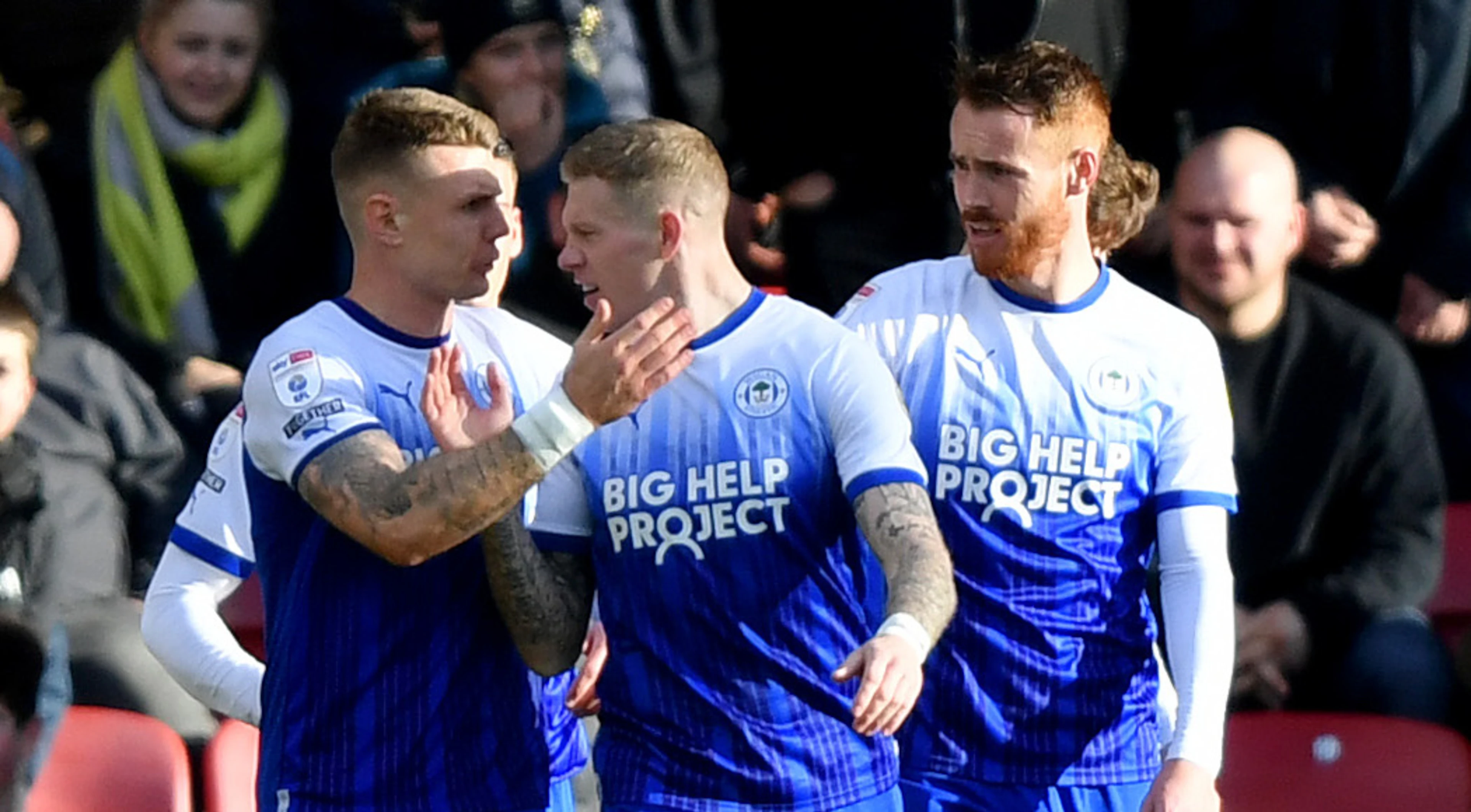 Wigan say remaining players and staff paid overdue wages