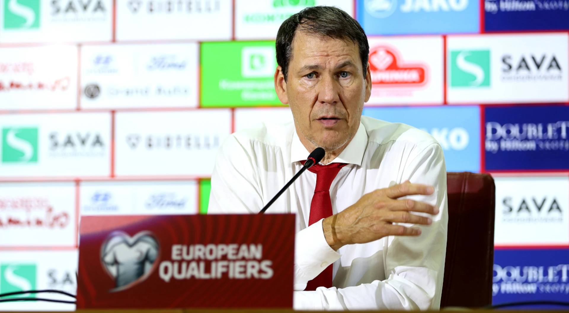 Belgium coach shows faith in shaky defence