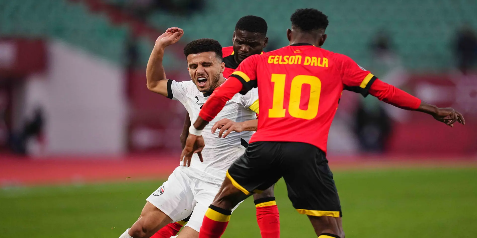 ANGOLA OUSTED: Egypt top Group B after stalemate