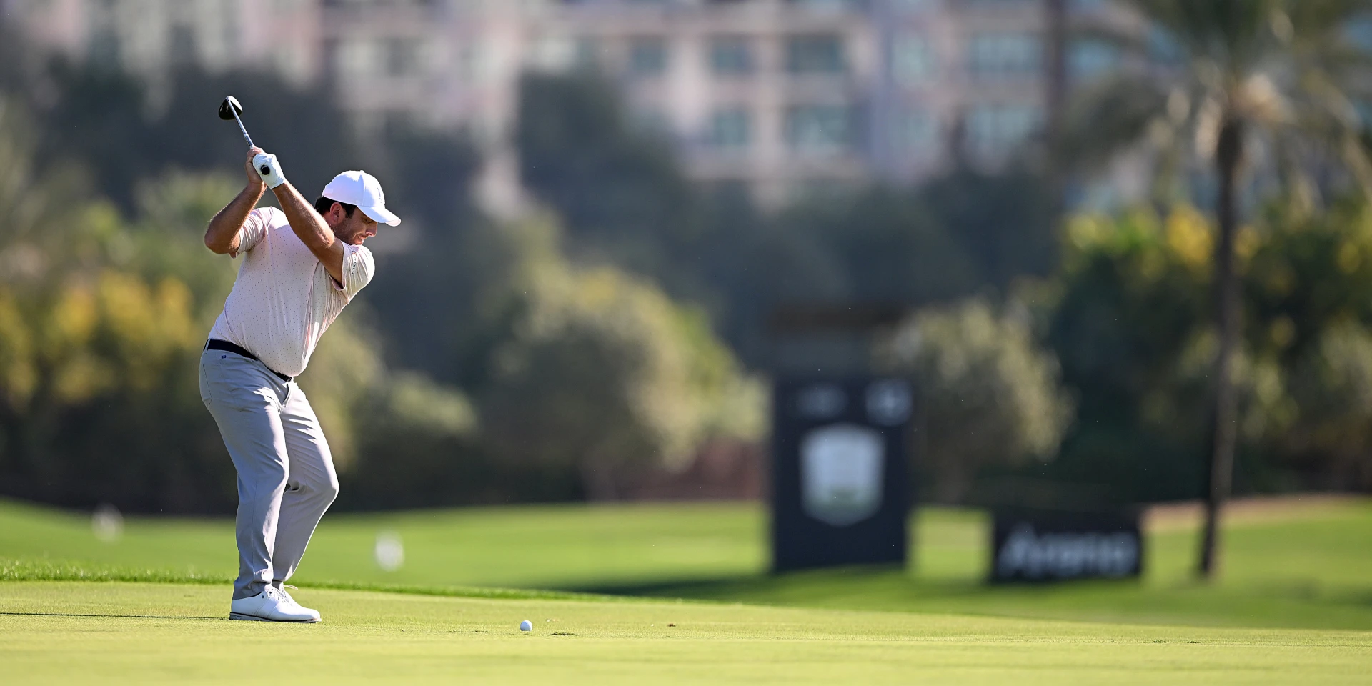 Molinari leads Dubai Desert Classic as McIlroy struggles