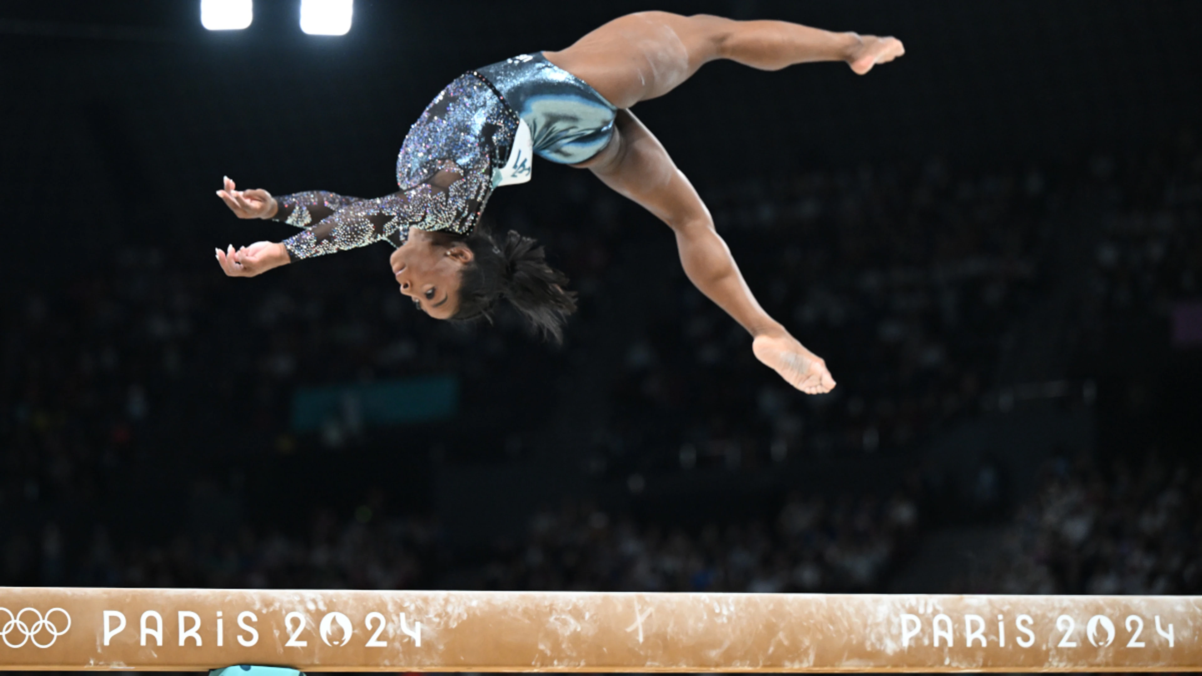 Biles dazzles in Paris Olympics opening beam routine