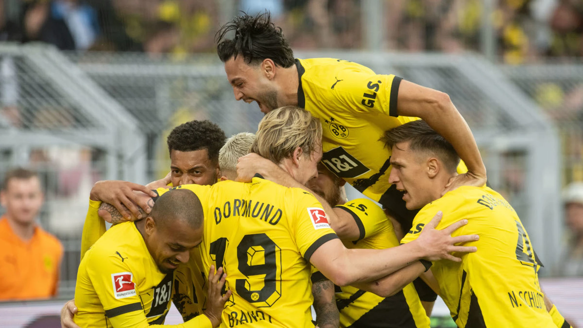 Reus goal hands Dortmund nervous win over Wolfsburg