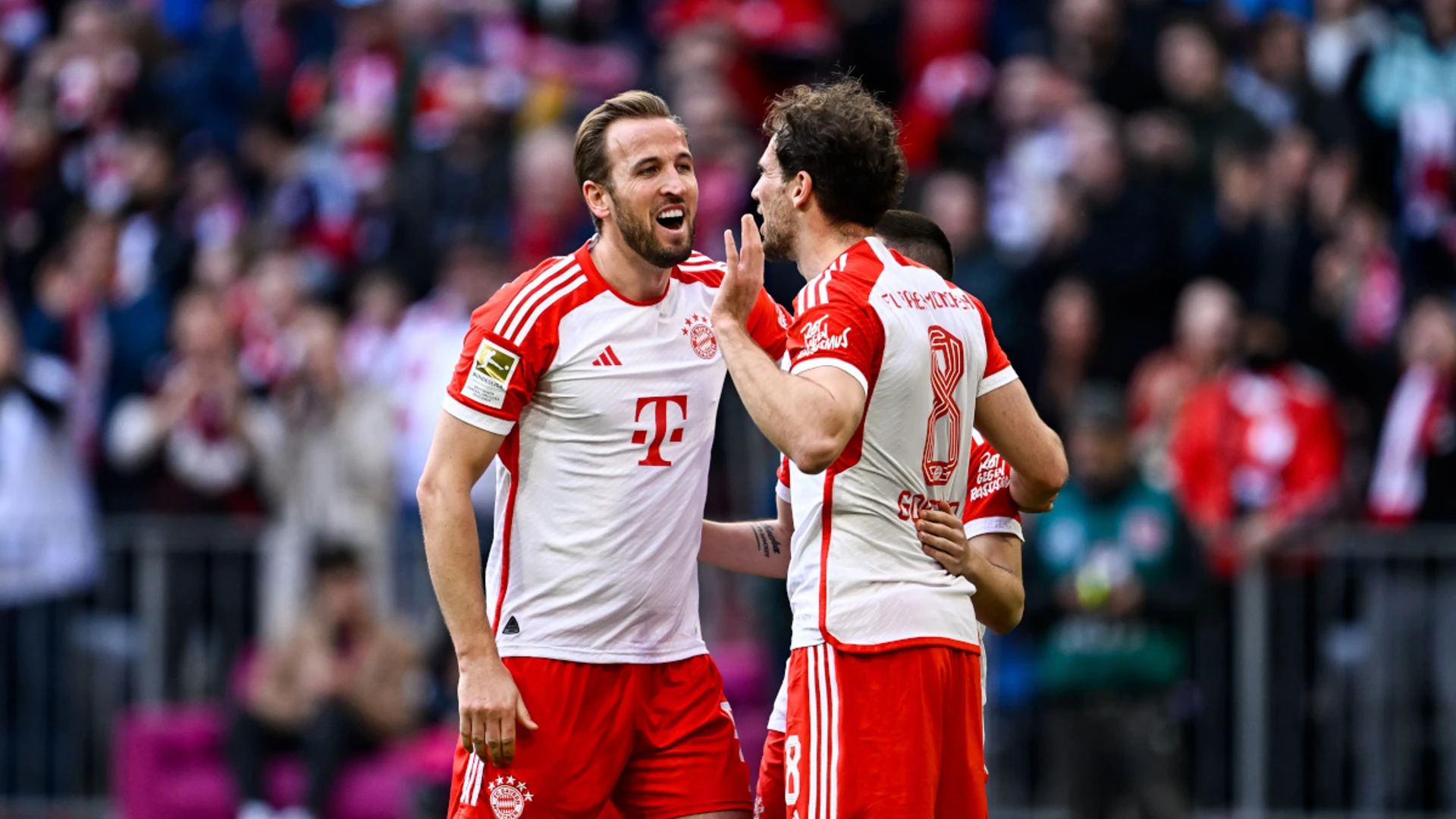 Record-breaking Kane nets hat-trick as Bayern humble Mainz 