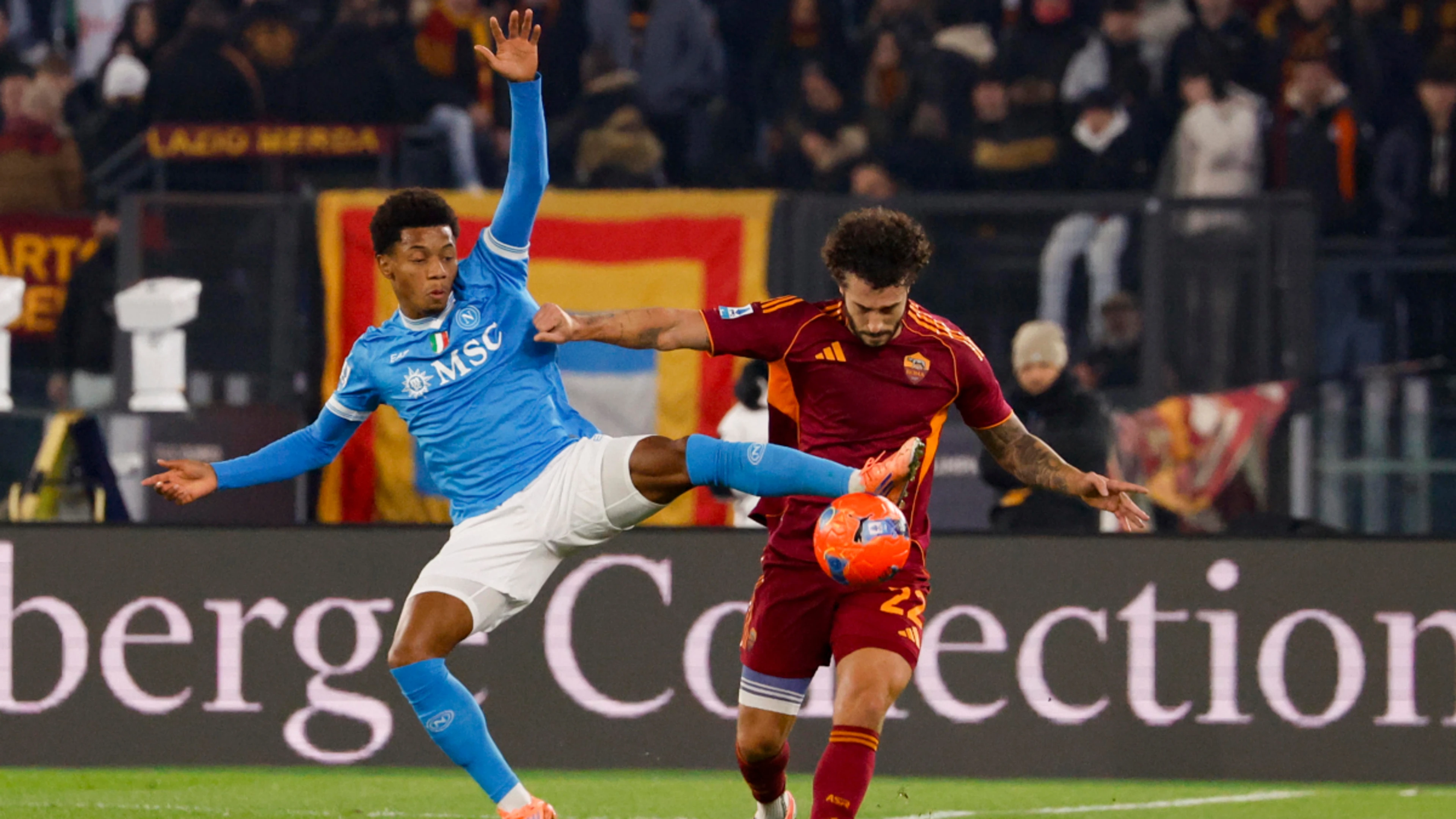 Napoli halt Roma's climb to the top with away win