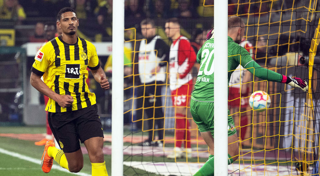 Dortmund put six past Cologne to top Bundesliga