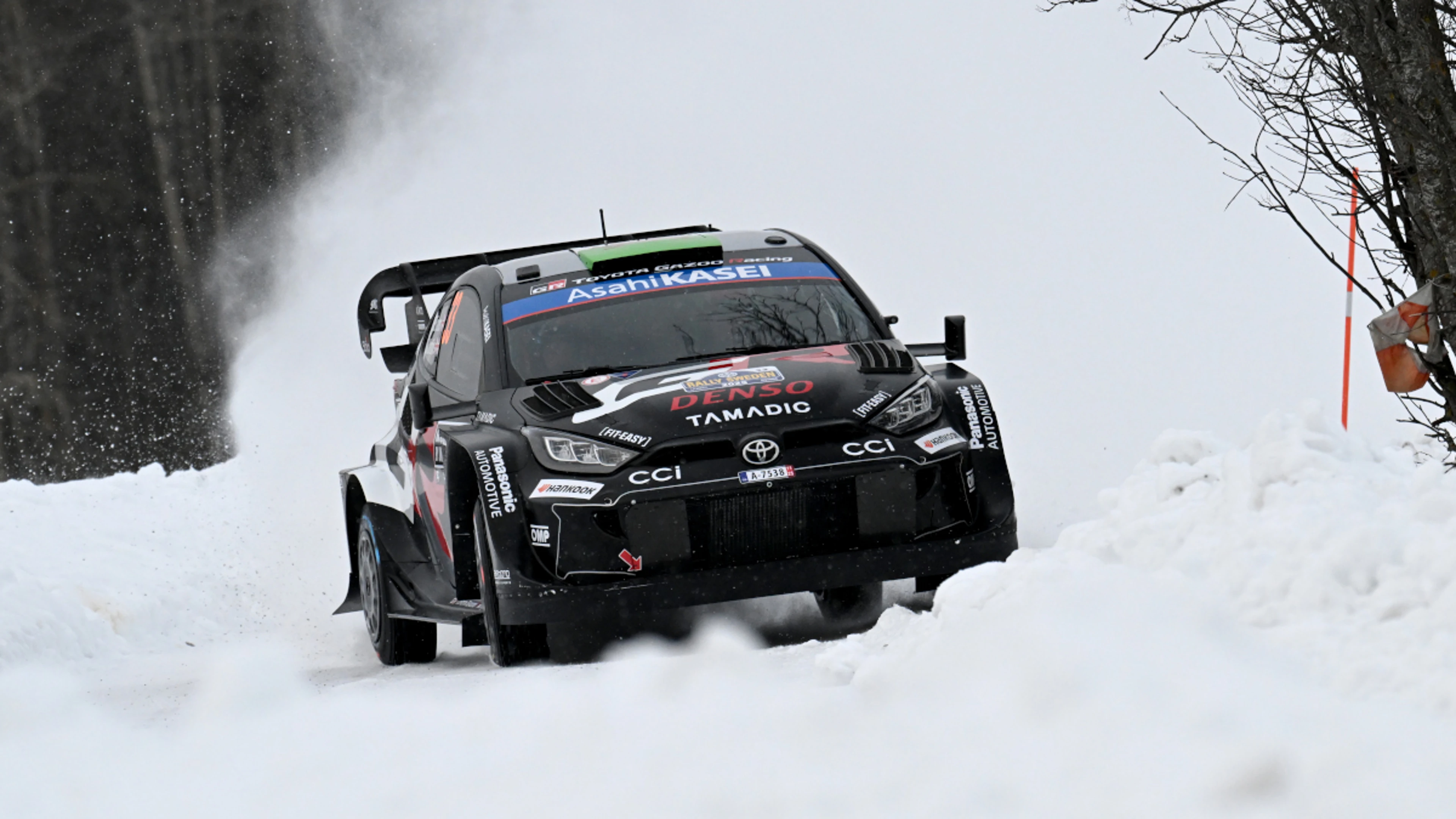 Snow king Evans leads tight race at Rally Sweden