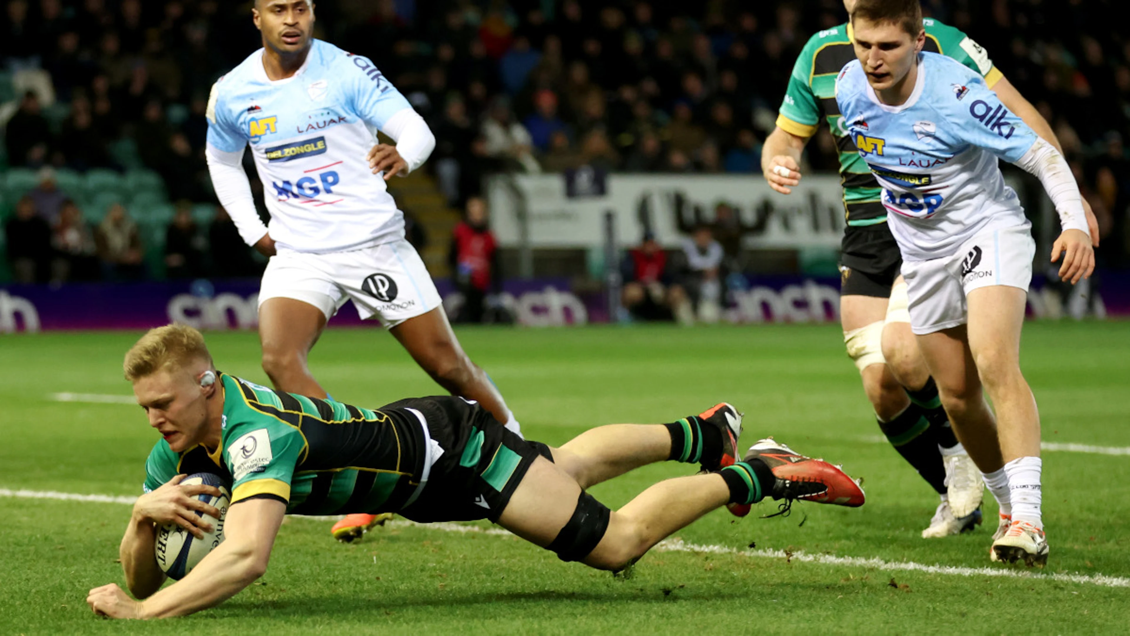 Nine-try Northampton into Champions Cup knockout round