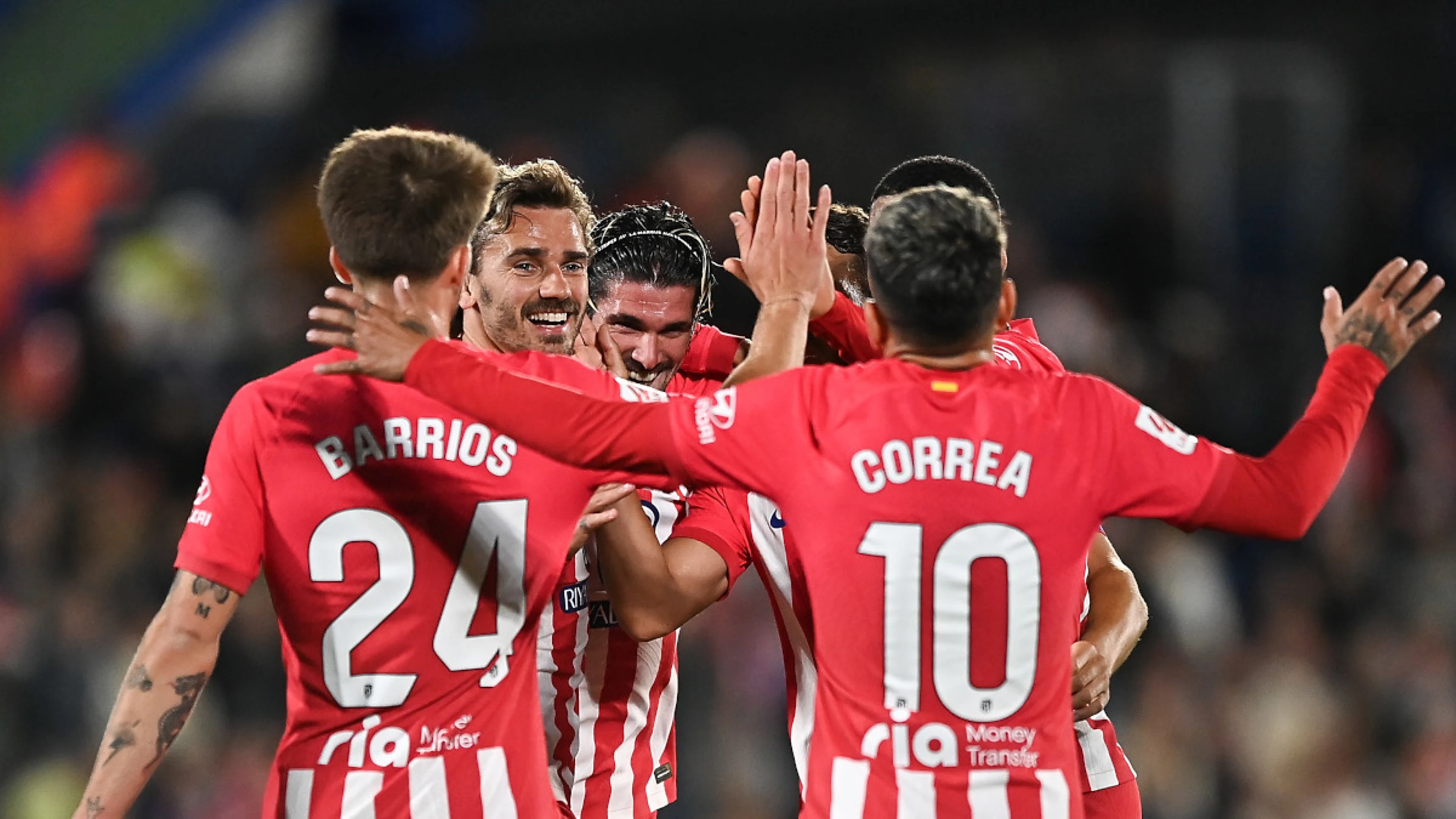 Griezmann hat-trick fires Atletico into Champions League