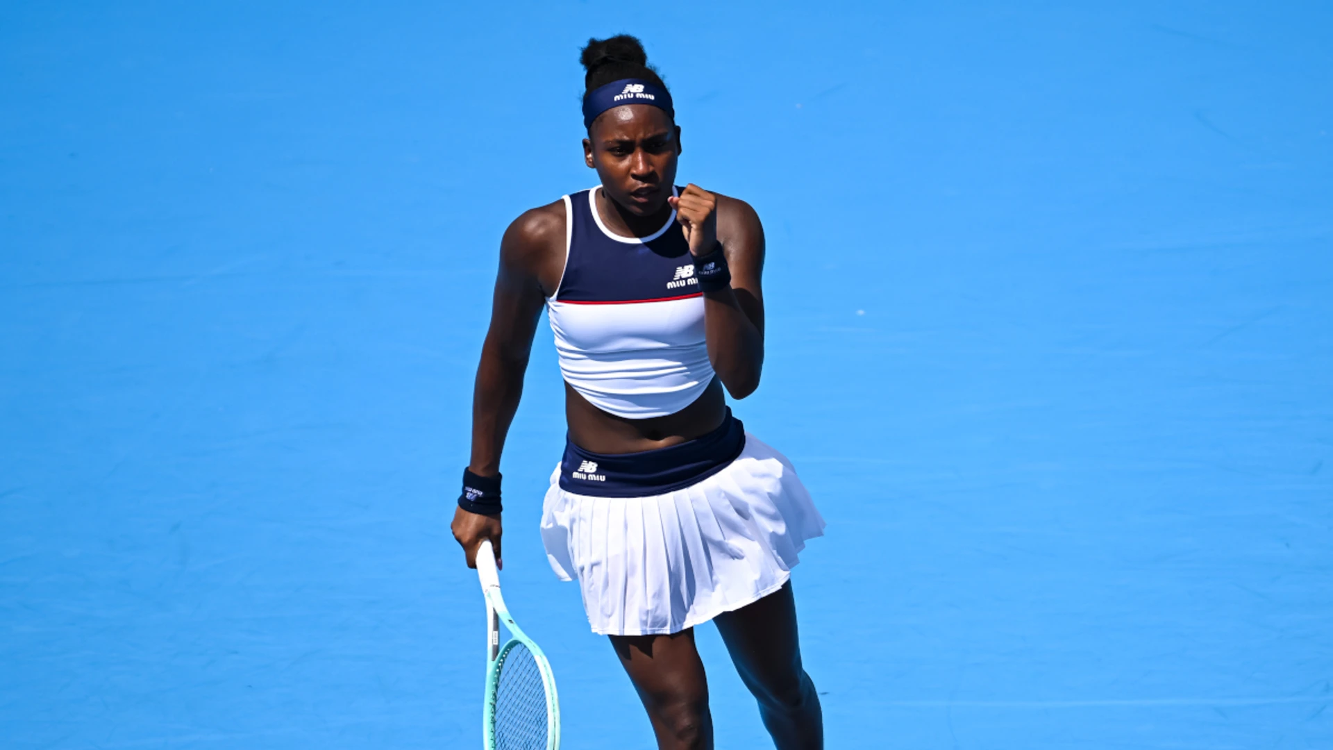 Gauff battle past Xinyu