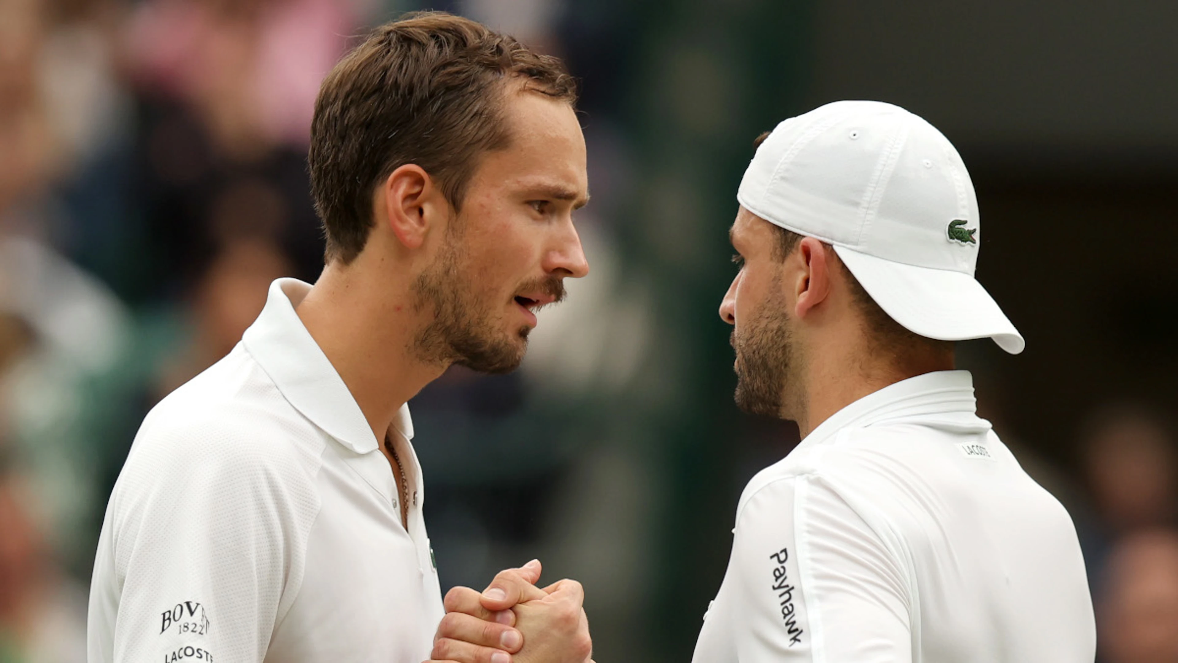 Medvedev into Wimbledon last-eight as injured Dimitrov quits