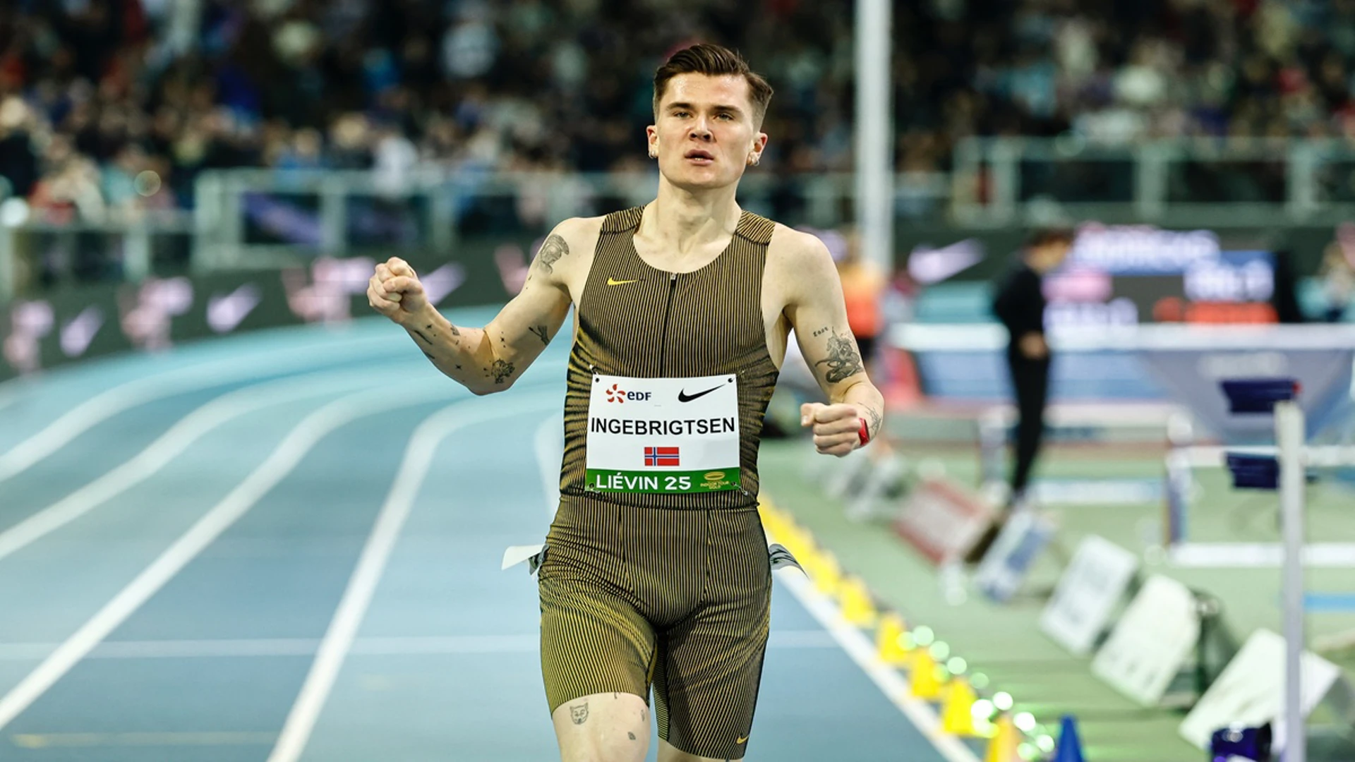 Ingebrigtsen breaks world indoor 1 500m, mile records