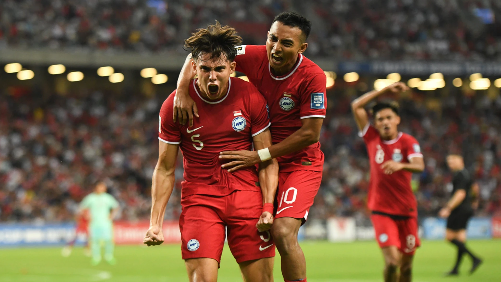 New coach sees China let two-goal lead slip in Singapore stalemate