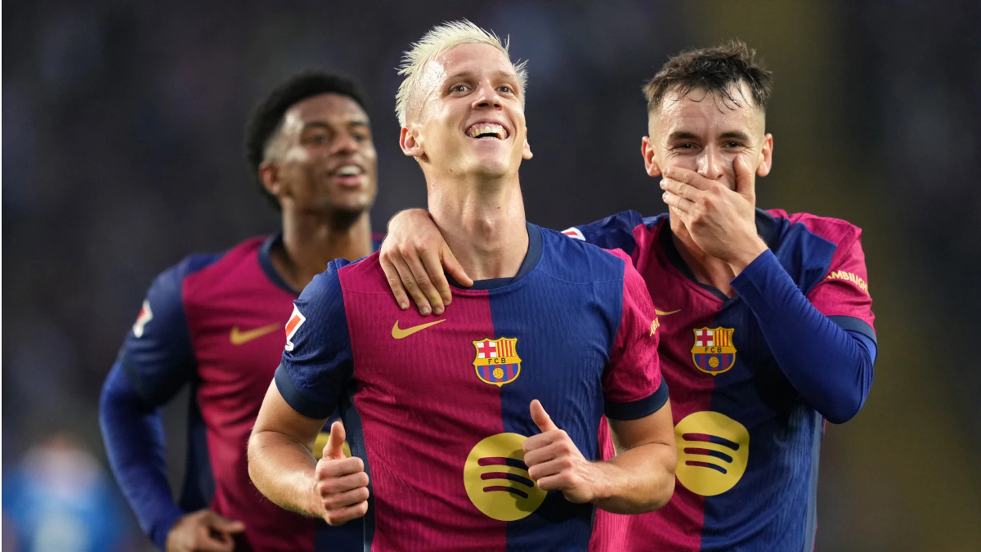 Olmo double helps Liga leaders Barca to derby win over Espanyol