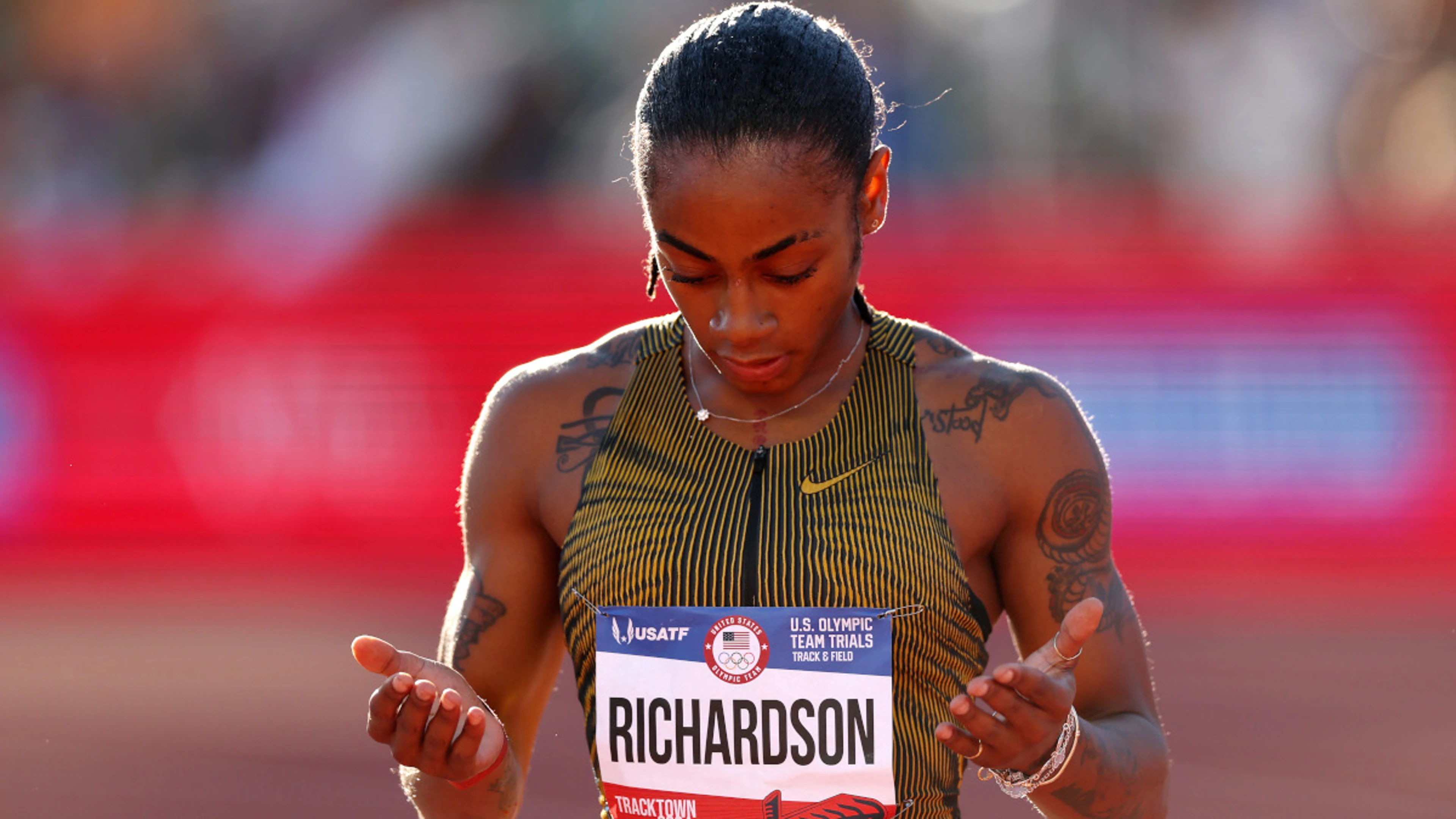 Richardson Olympic double bid over as Lyles marches on