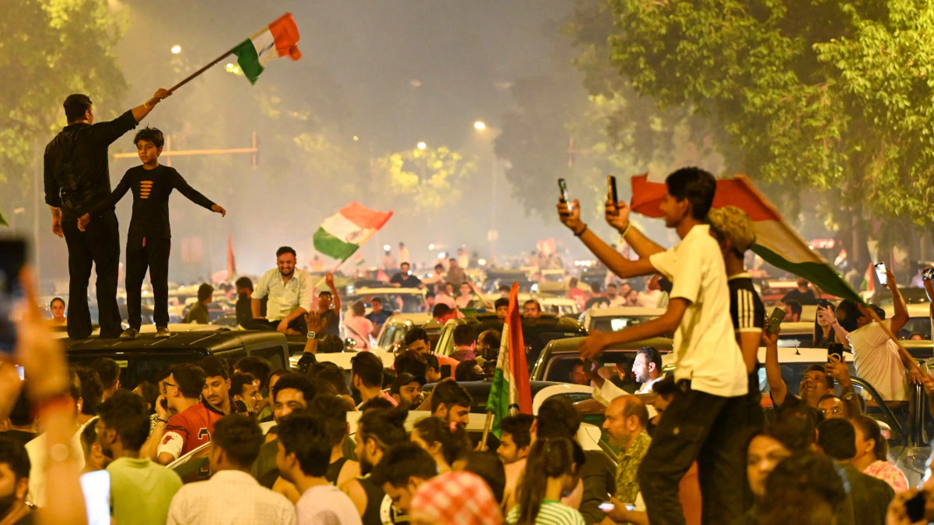 Fan frenzy as World Cup winners India finally return home