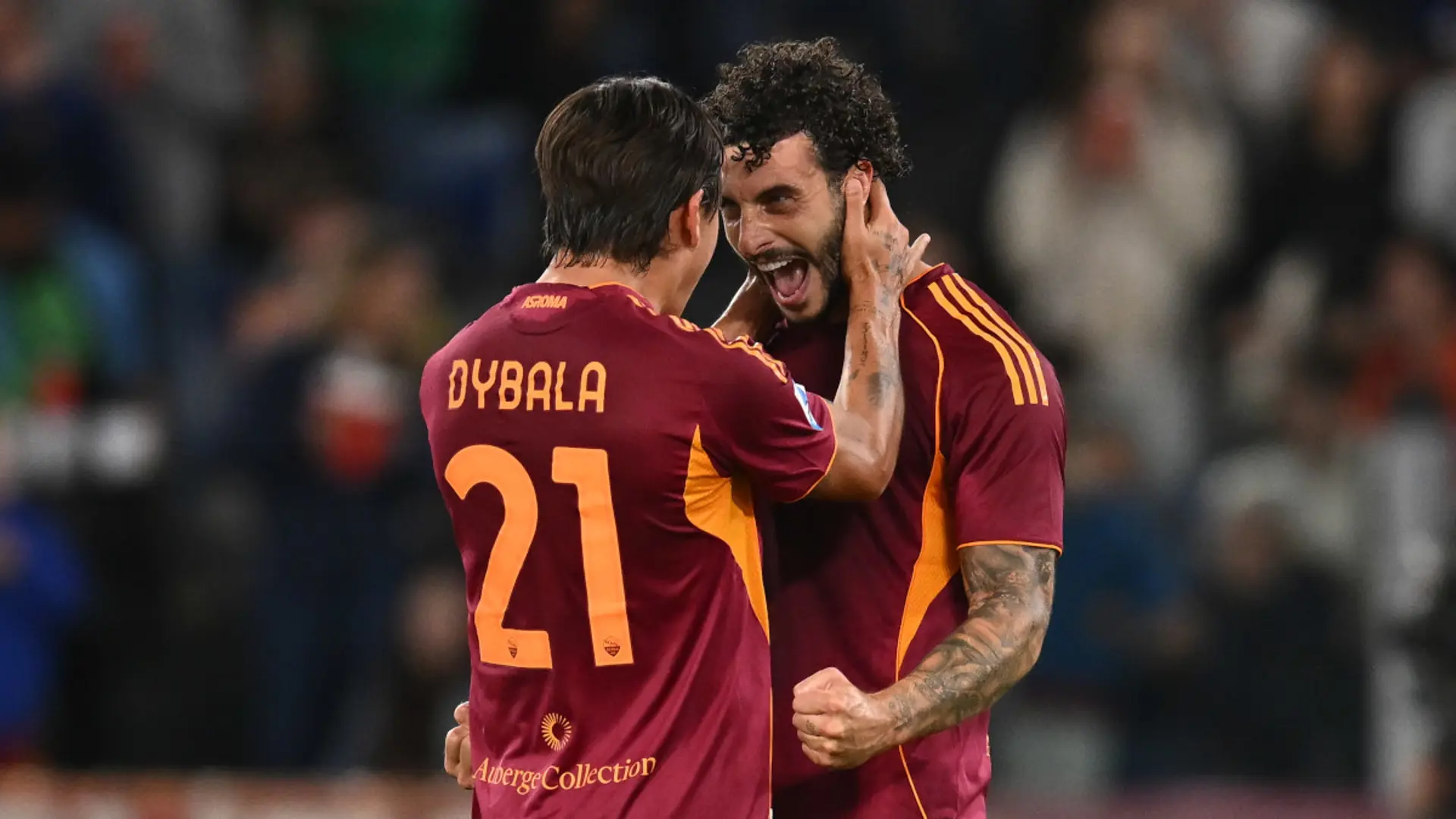 Roma hold firm against late Parma push to stay joint top