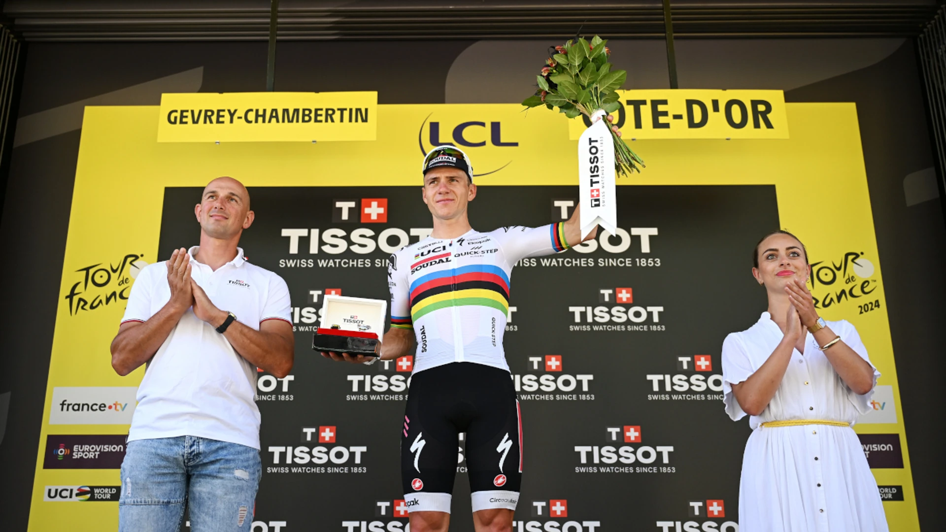 Evenepoel survives fright to win time-trial as Pogacar holds lead