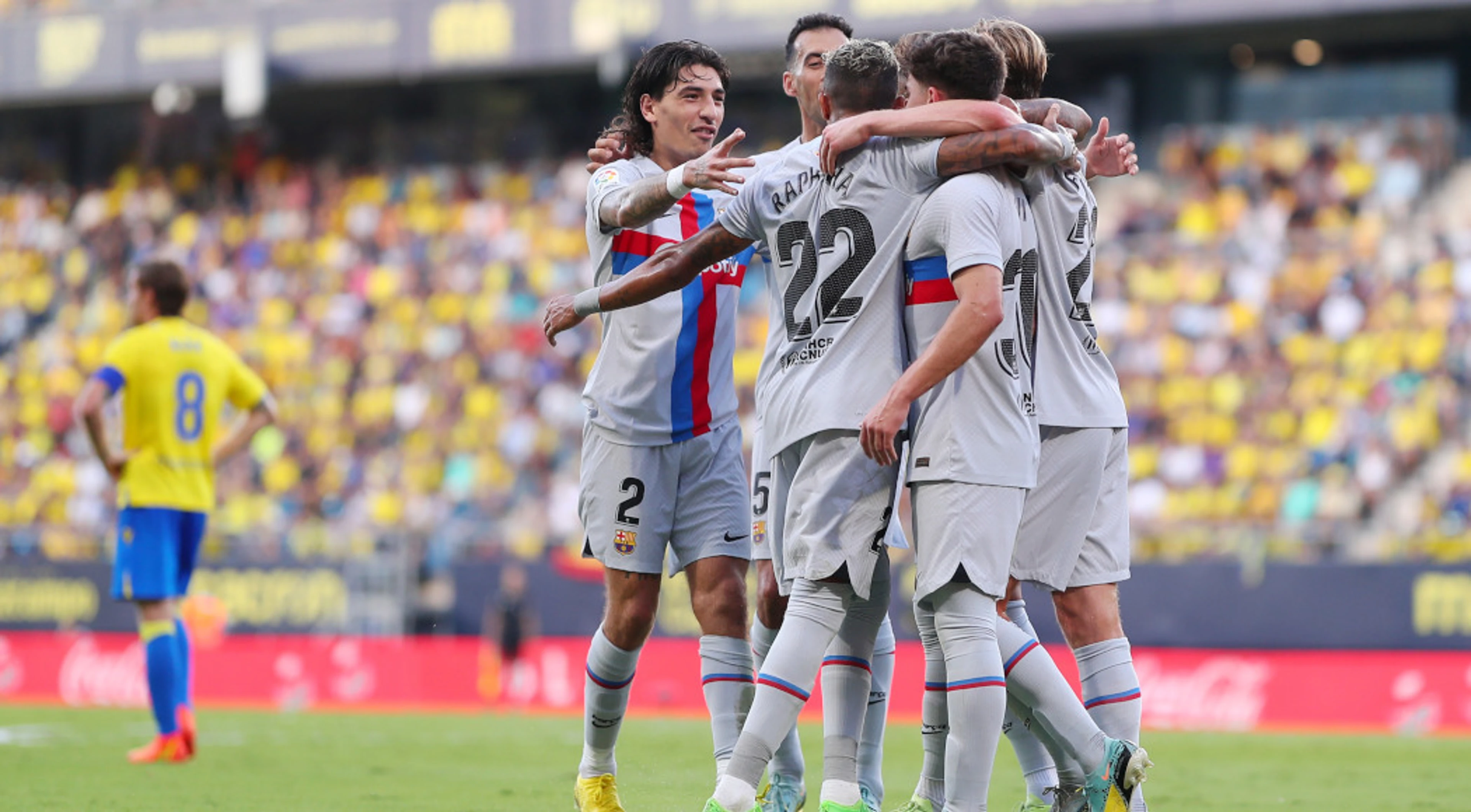 Barca hit four at Cadiz and move top