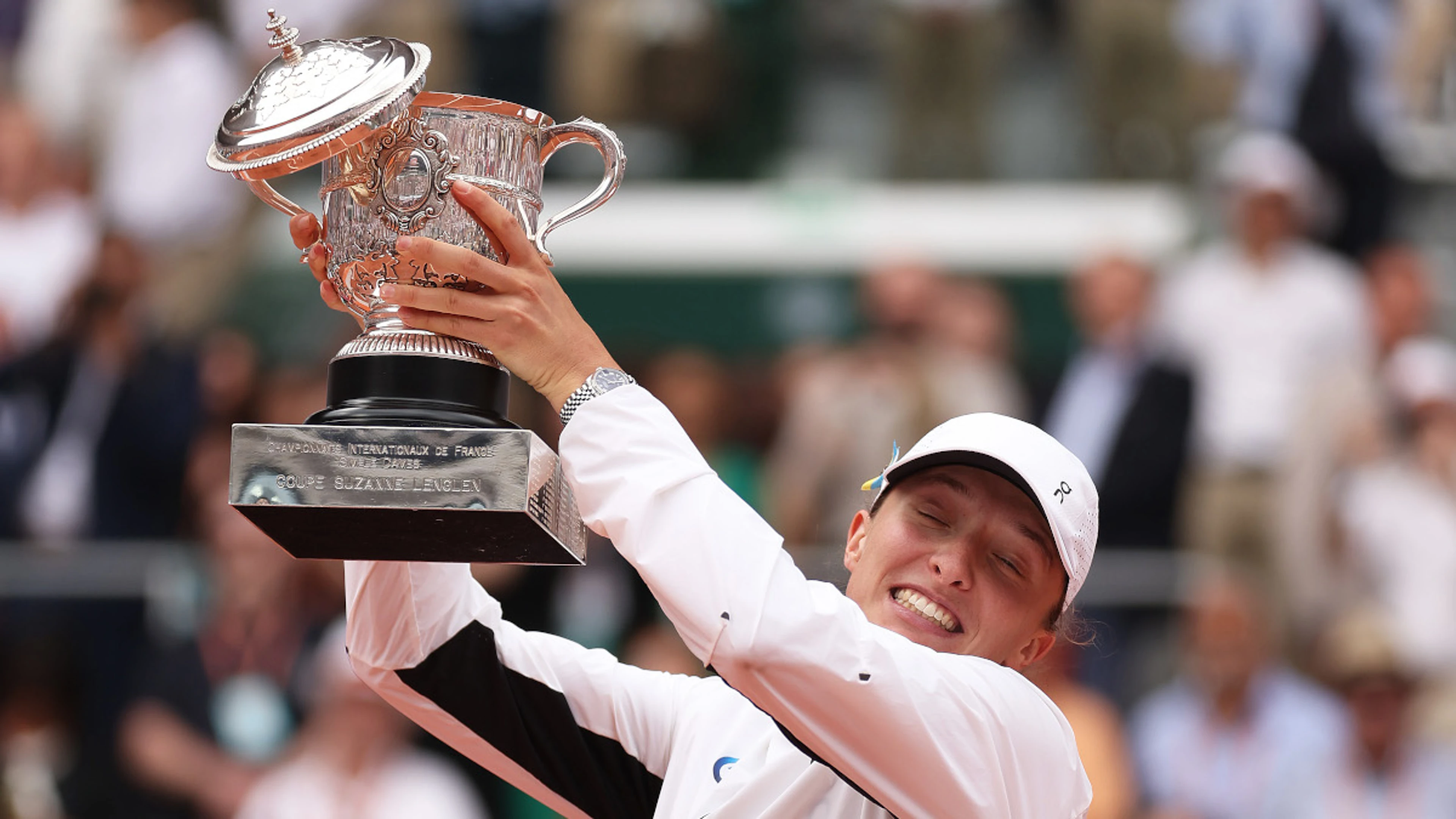 Swiatek keeps lid on expectations despite Evert's prediction