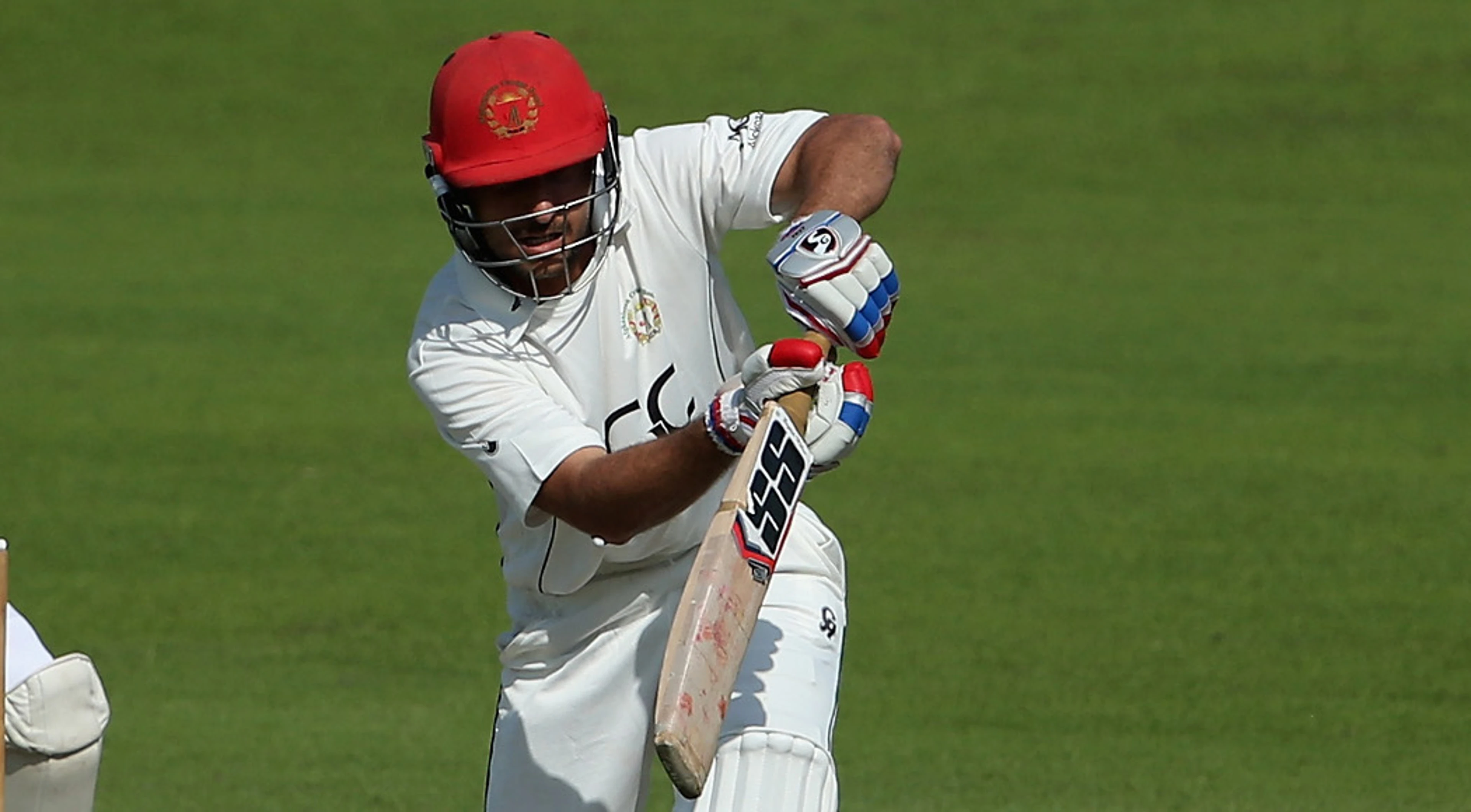 Shah steers Afghanistan with historic ton