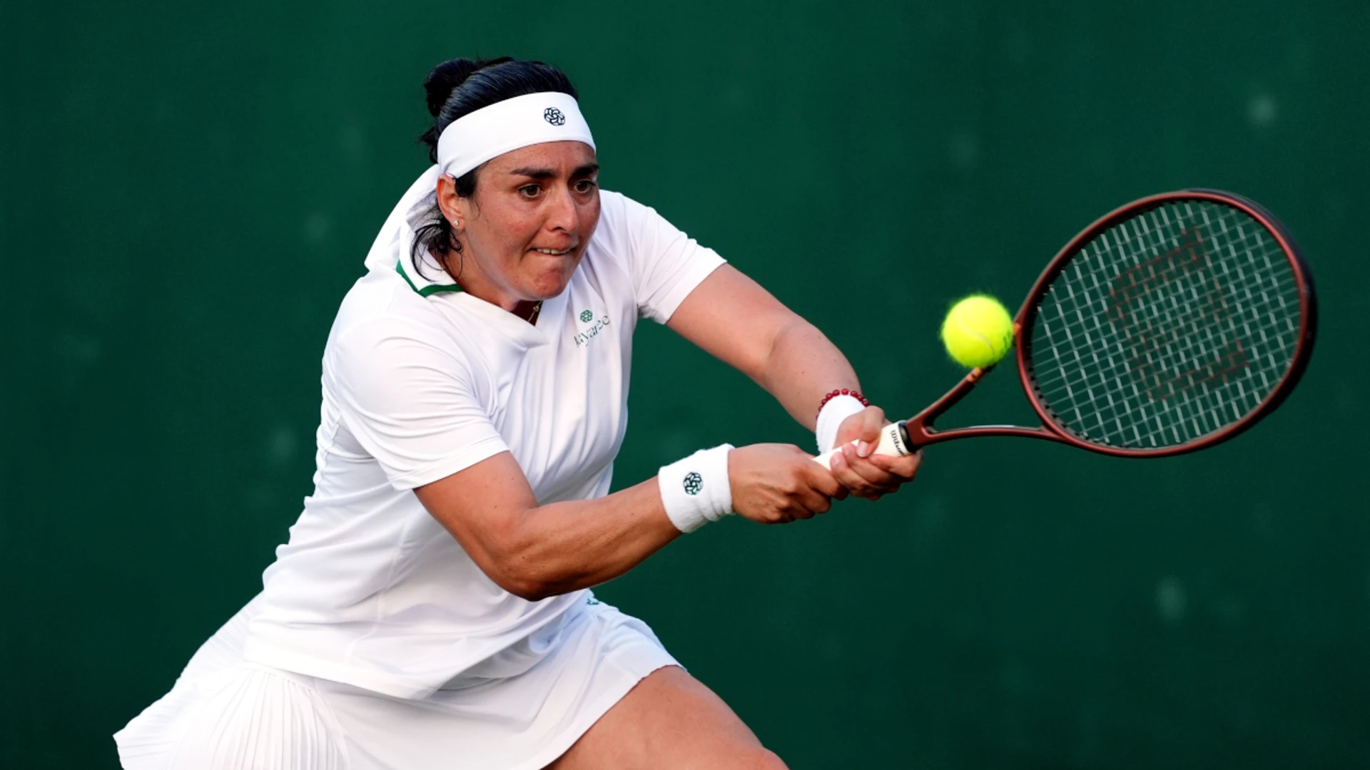 Jabeur blasts her way into Wimbledon second round in under an hour