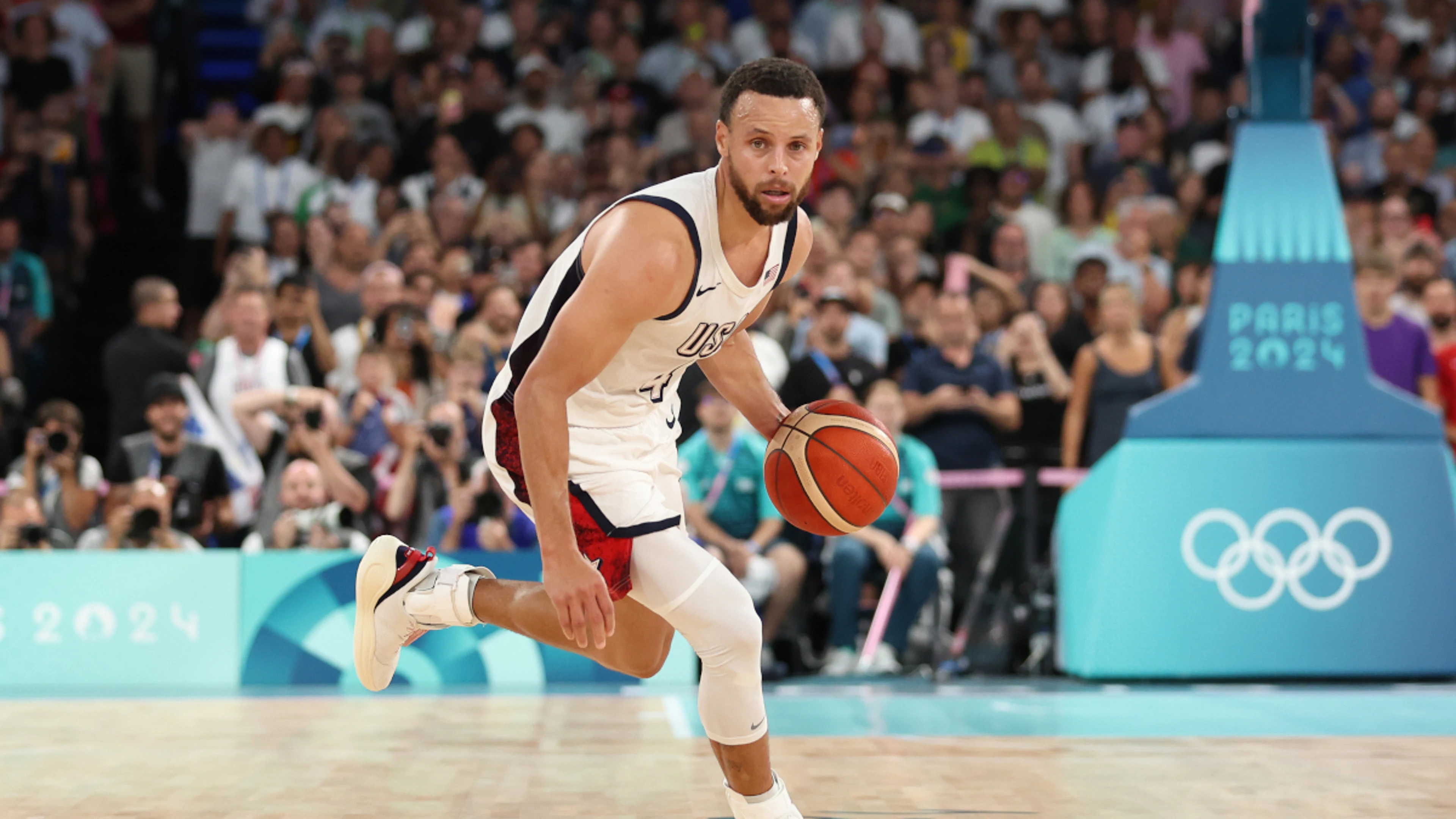 'Godlike' Curry keeps US alive in quest for Olympic gold