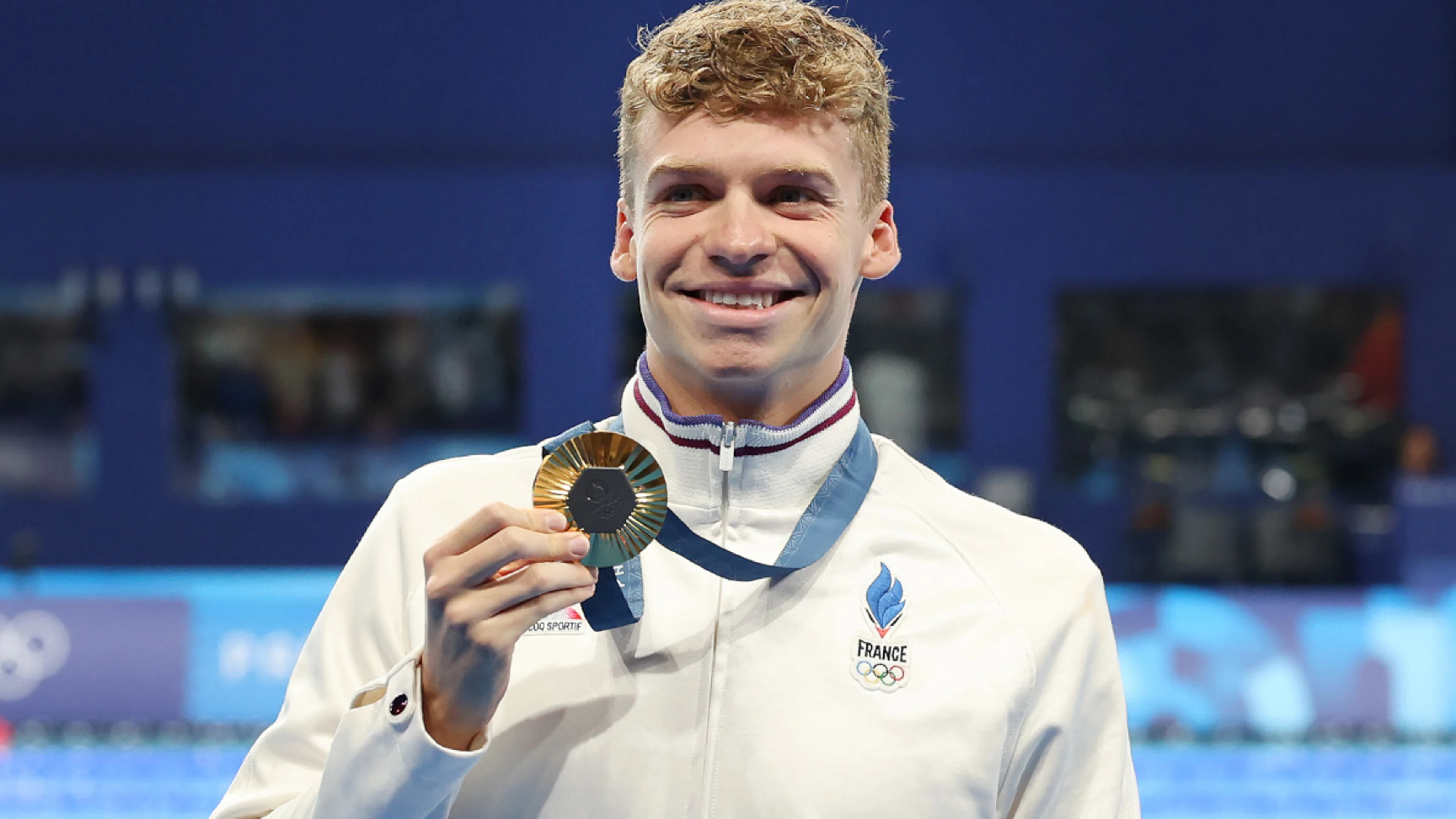 Marchand wins fourth Paris Olympics swimming gold