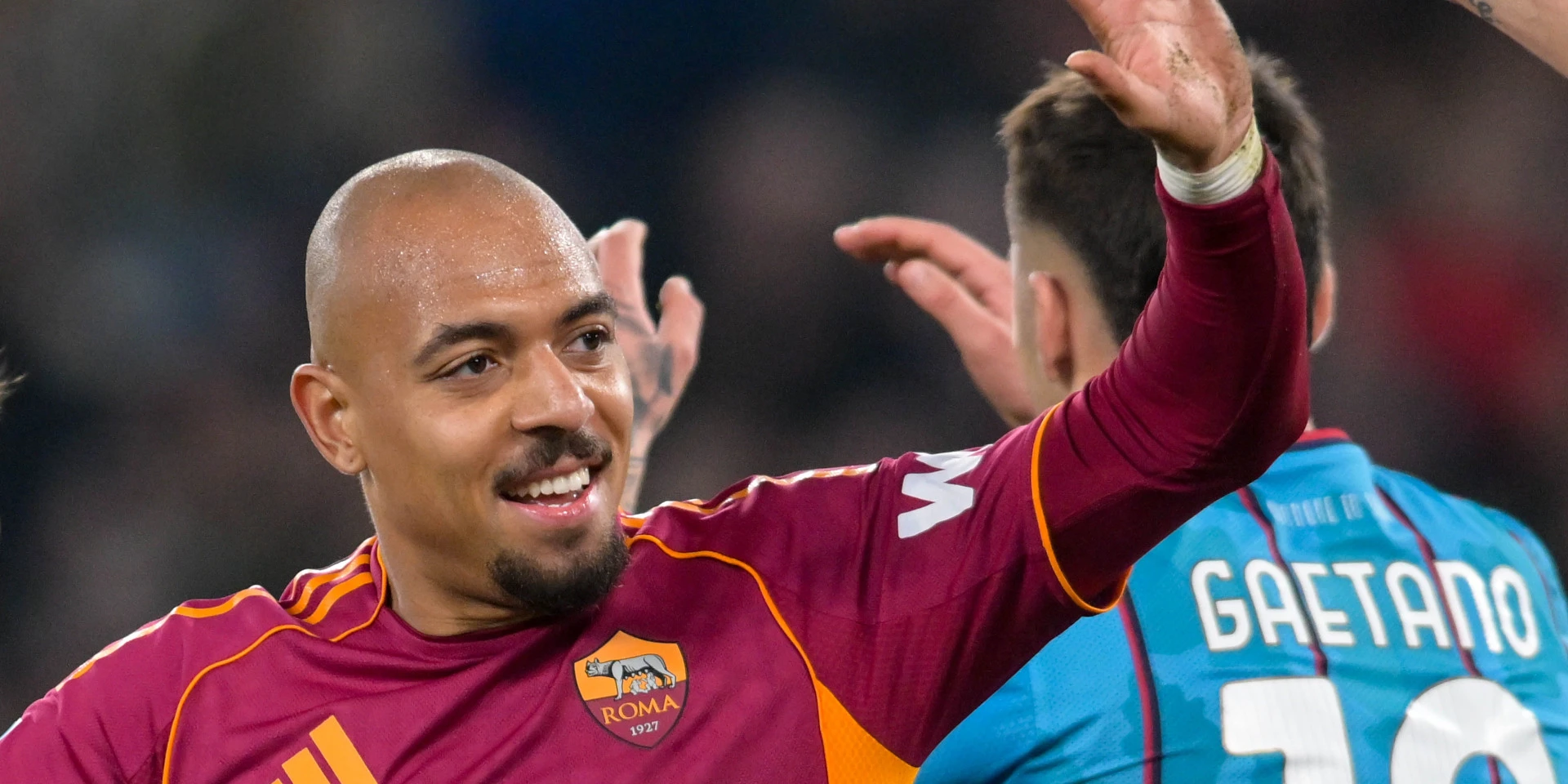 Malen double lifts Roma level with Juventus