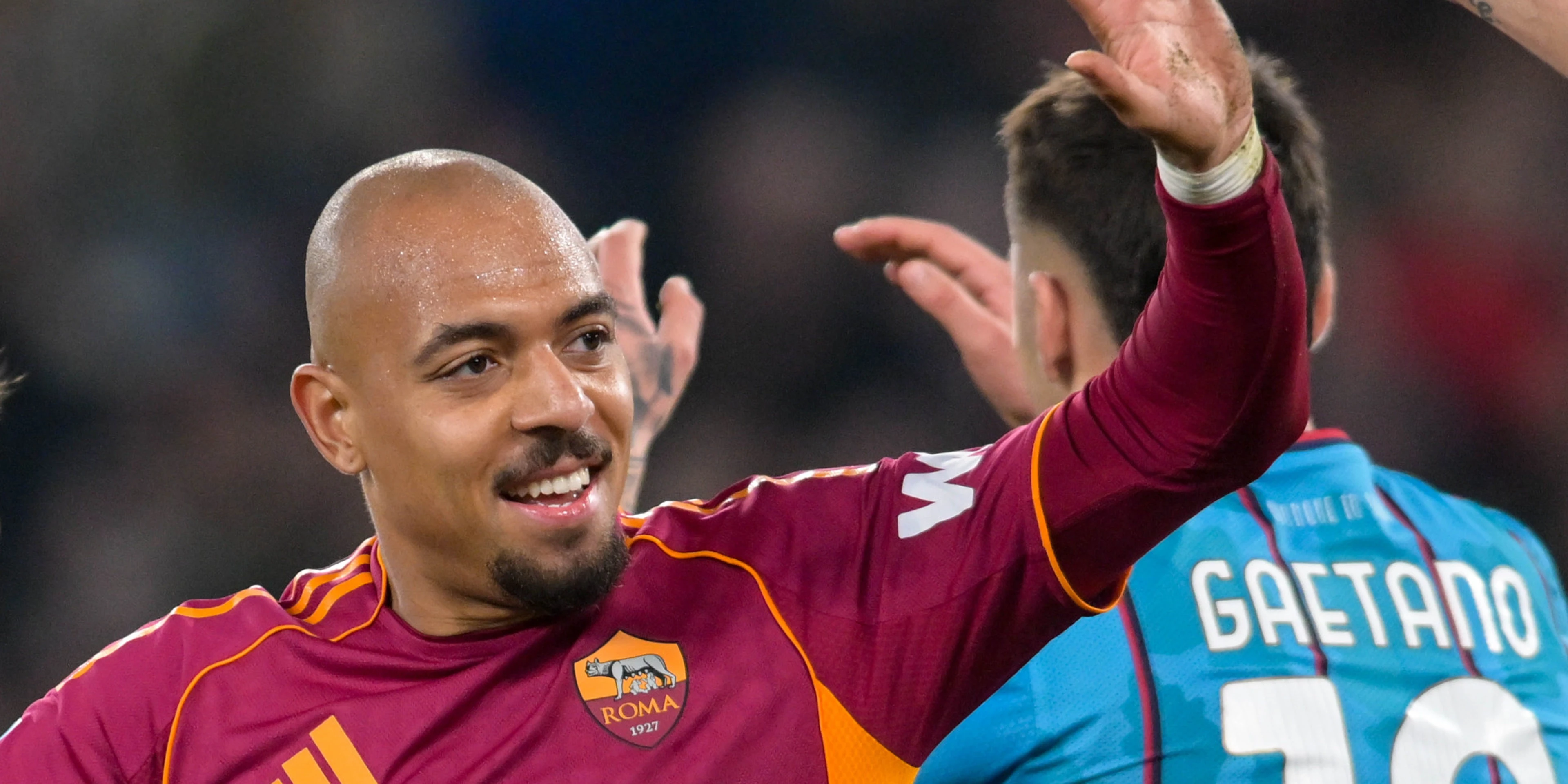 Malen double lifts Roma level with Juventus