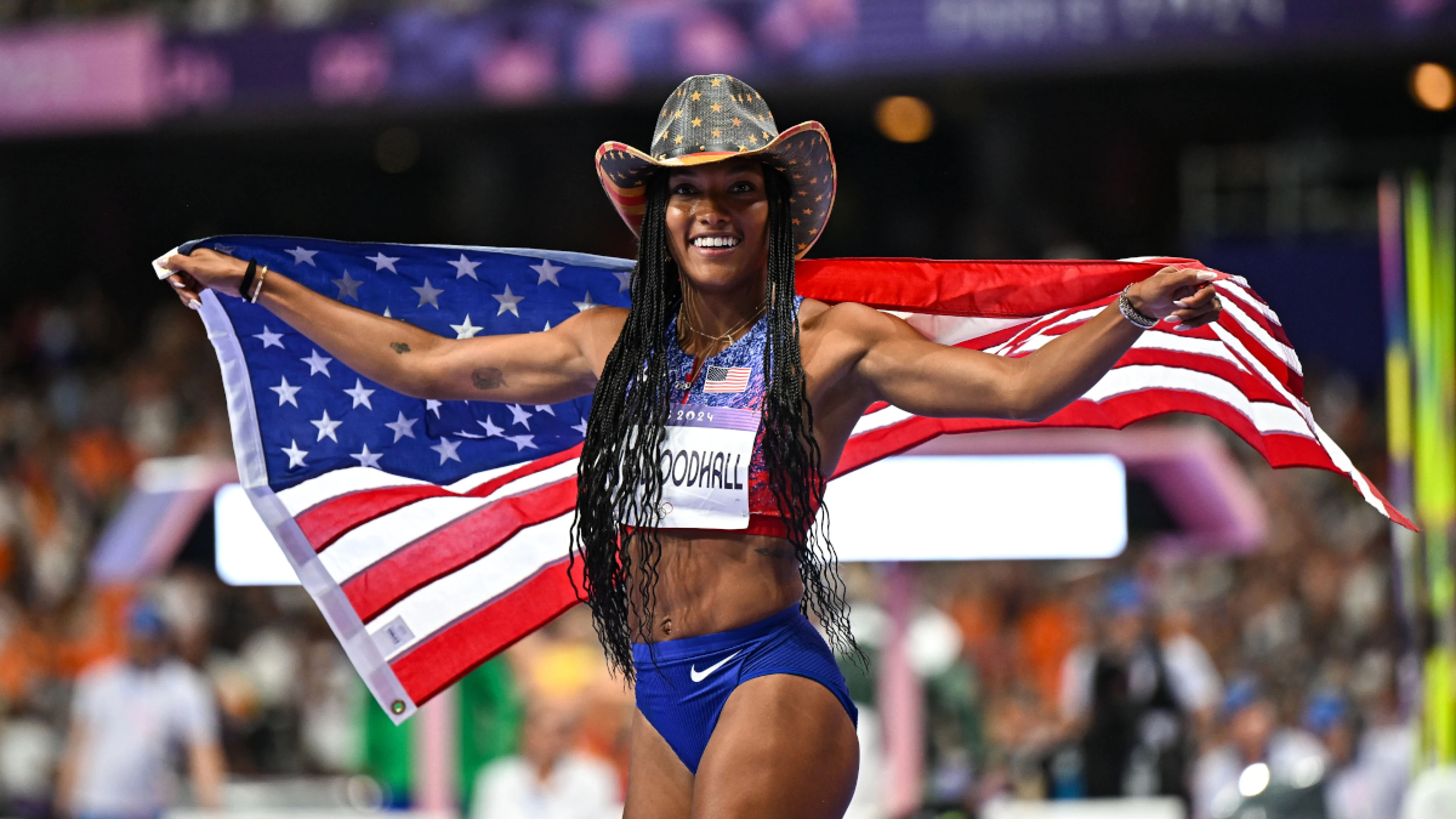 American Davis-Woodhall flies to first Olympic long jump title