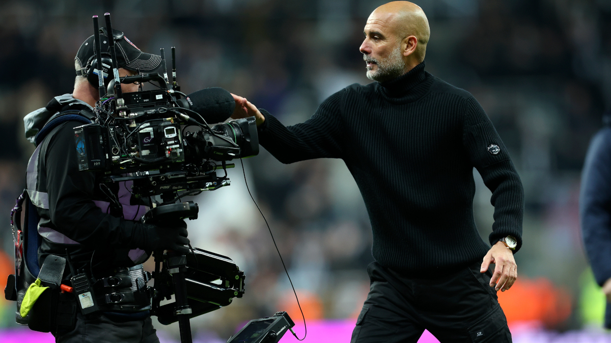 Man City's Guardiola apologises for confrontation with cameraman