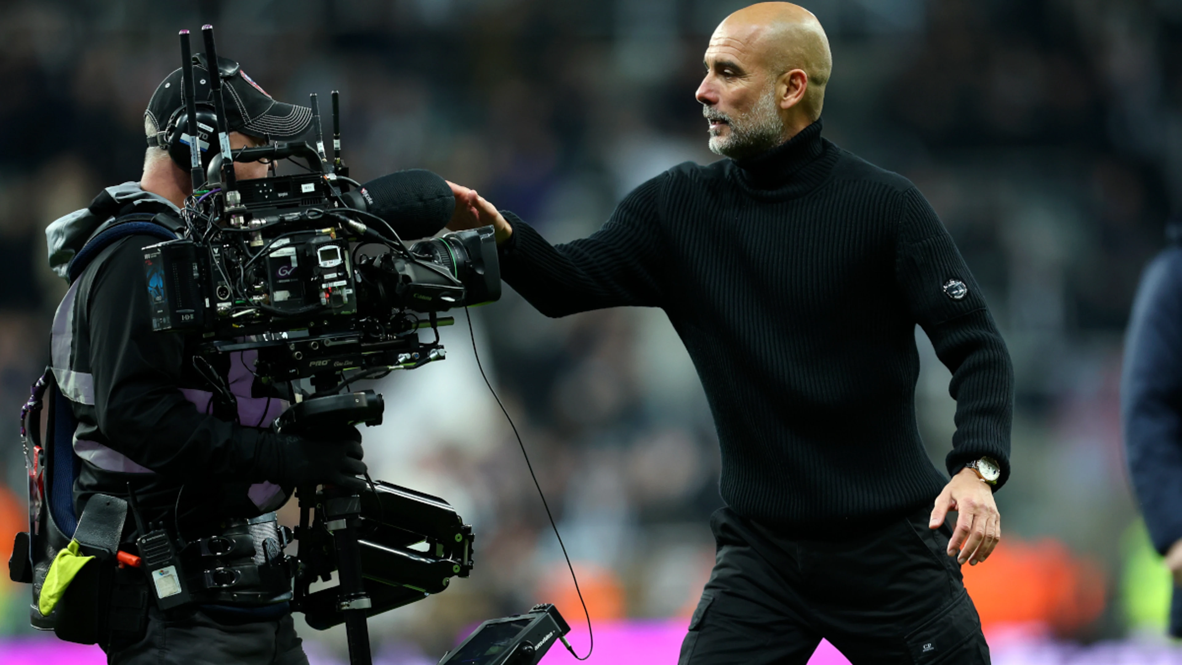 Man City's Guardiola apologises for confrontation with cameraman