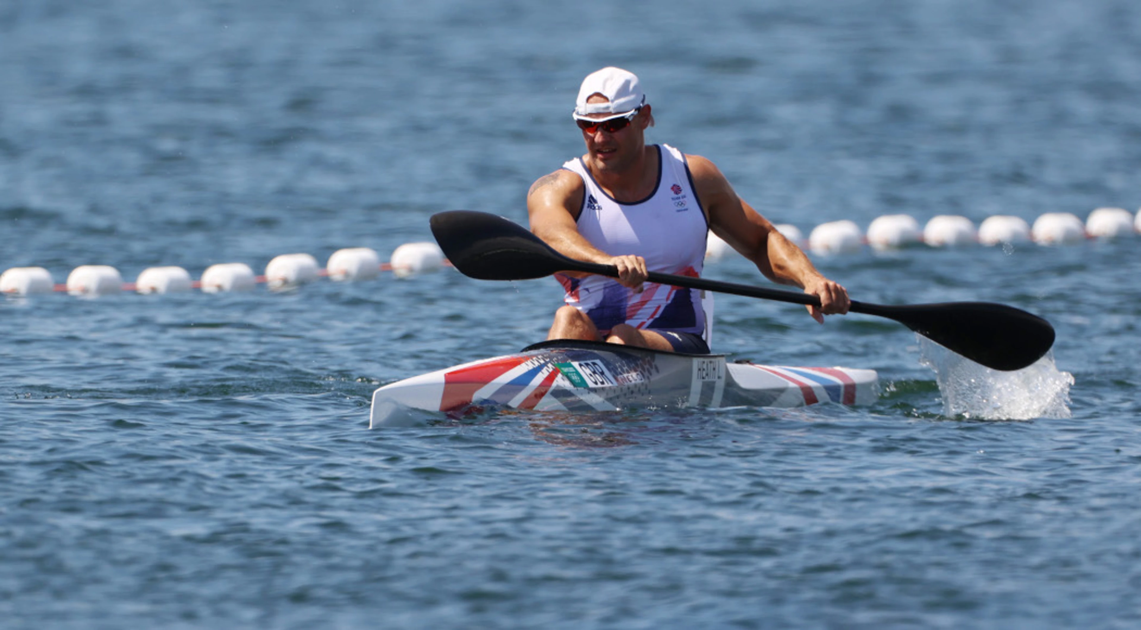 Canoe sprint-Briton Heath sets Olympic best time to reach semis