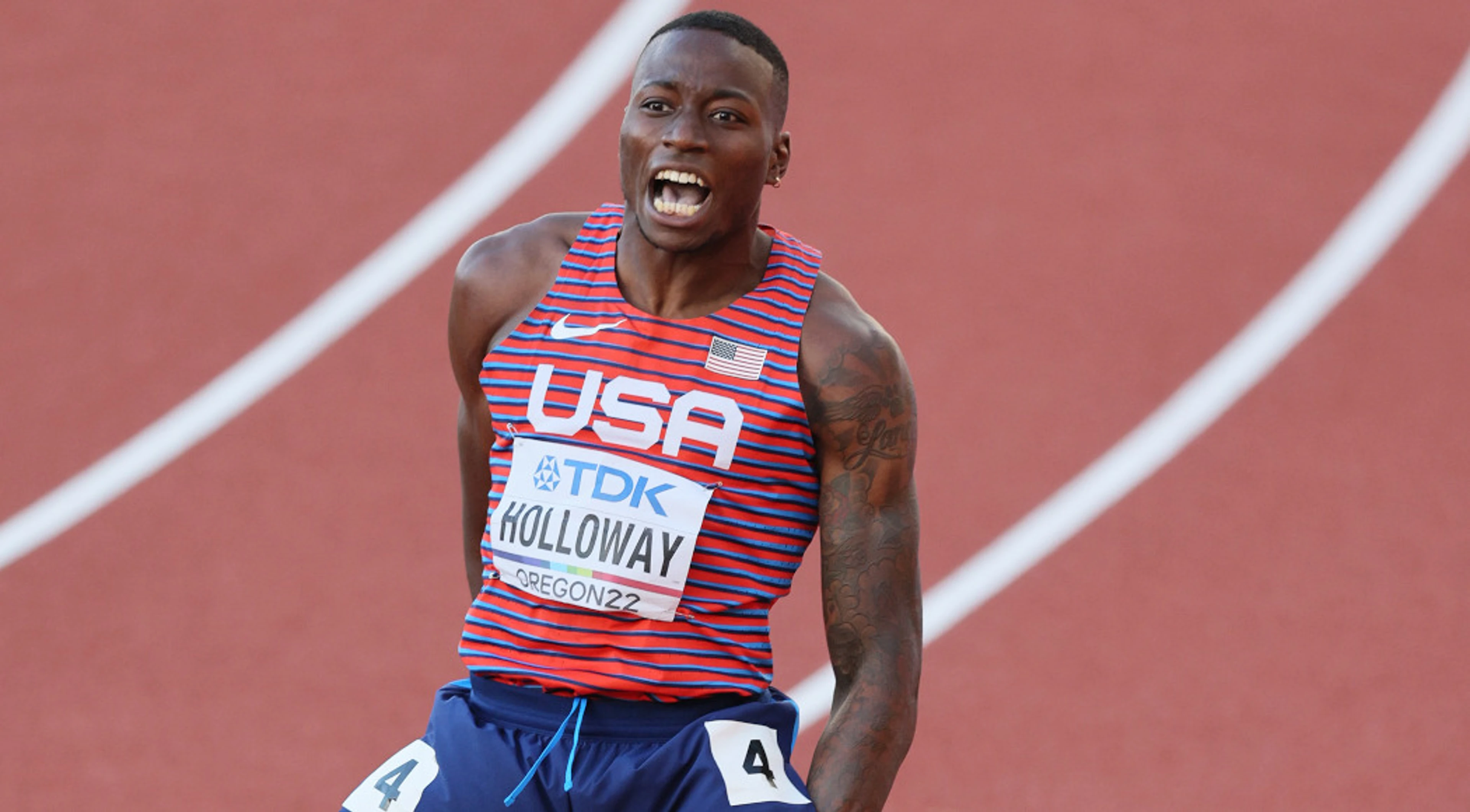 Holloway defends hurdles crown after final chaos