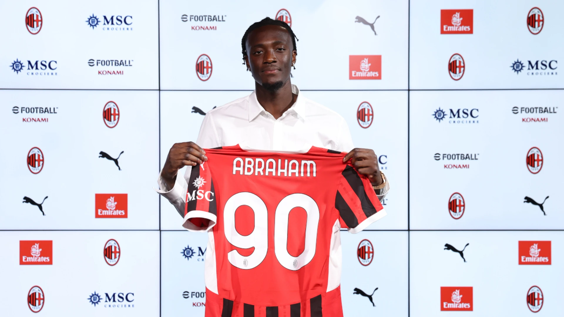 Roma's Abraham joins Milan on loan deal