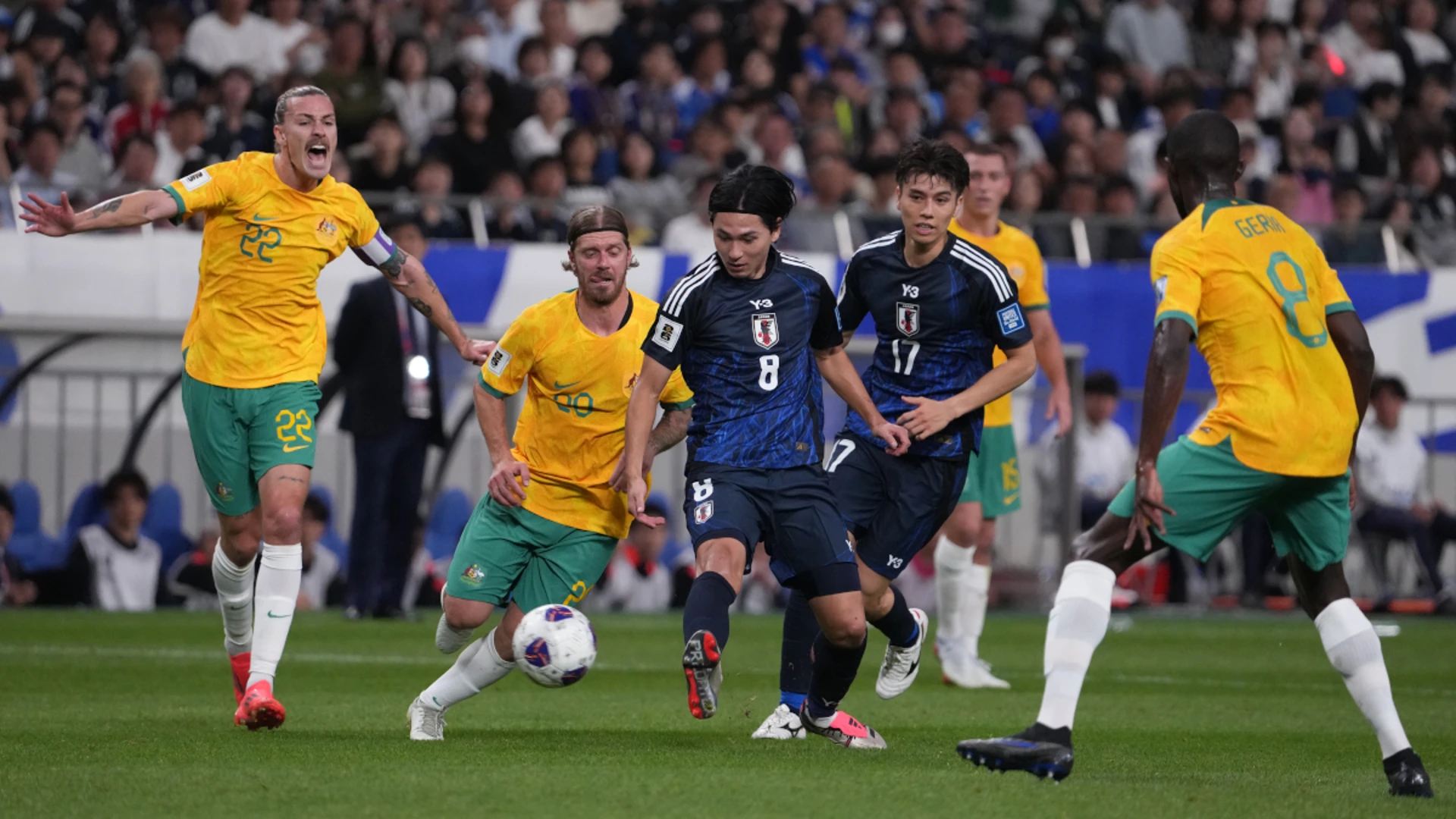 Australia end Japan's winning run as South Korea down Iraq