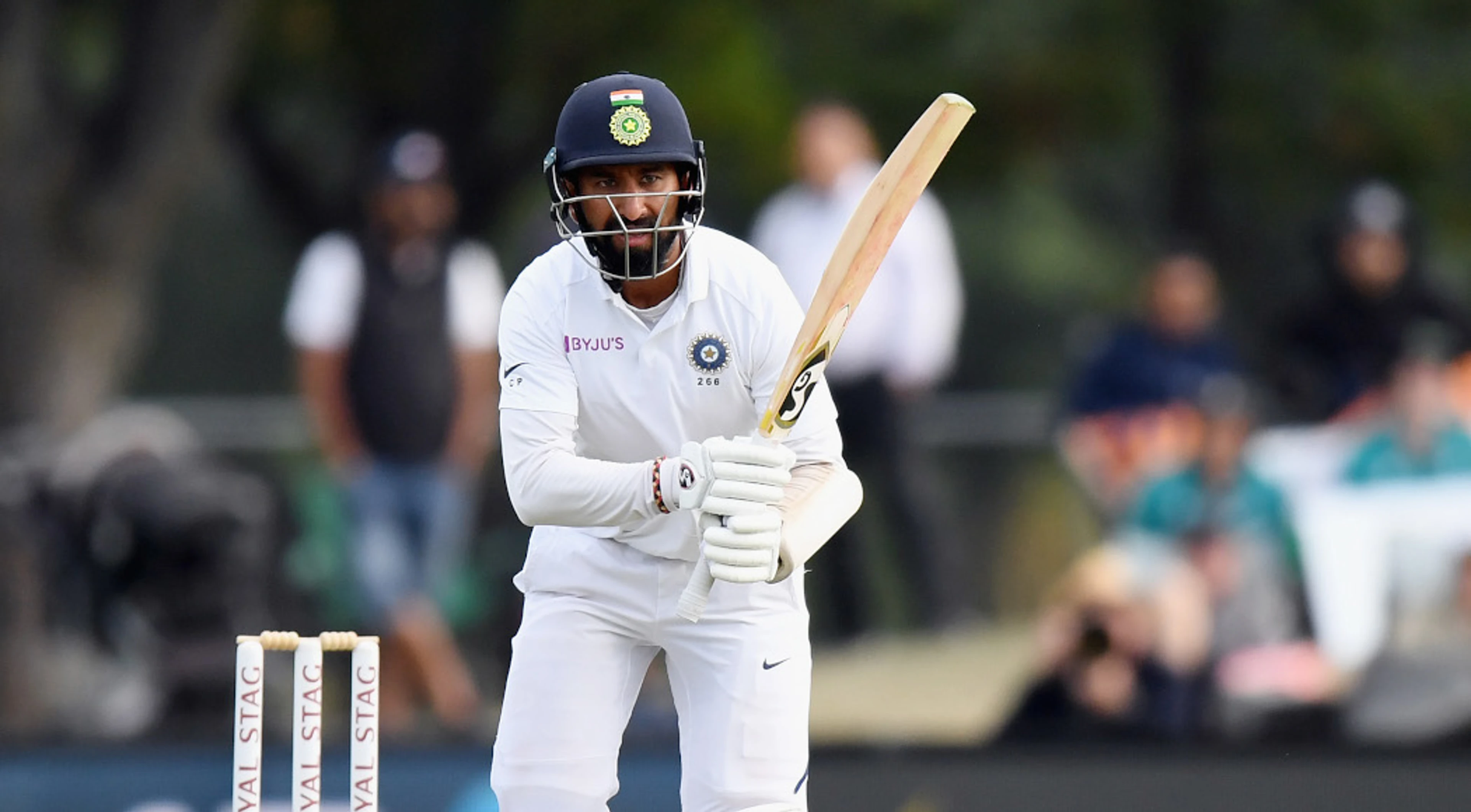 Unmoved by criticism, Pujara happy to be India's rock