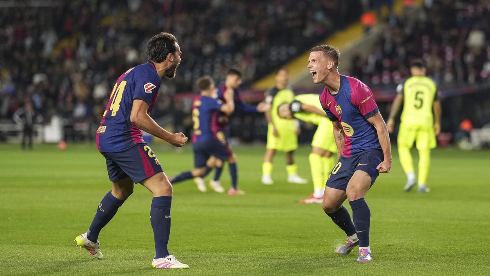 INCHING CLOSER TO TITLE: Olmo fires Barca past Mallorca