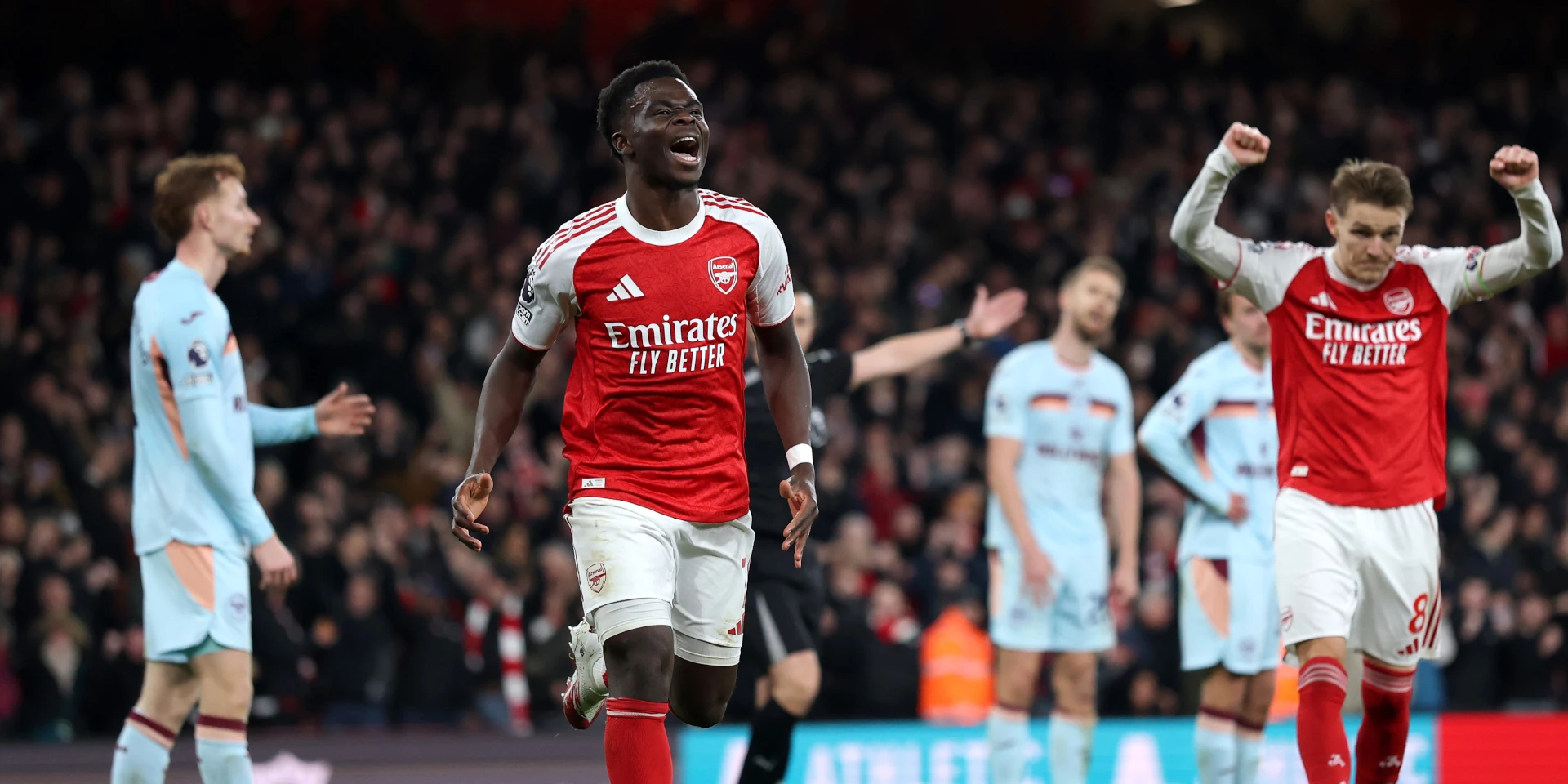 Merino, Saka strike to extend Arsenal's Premier League lead