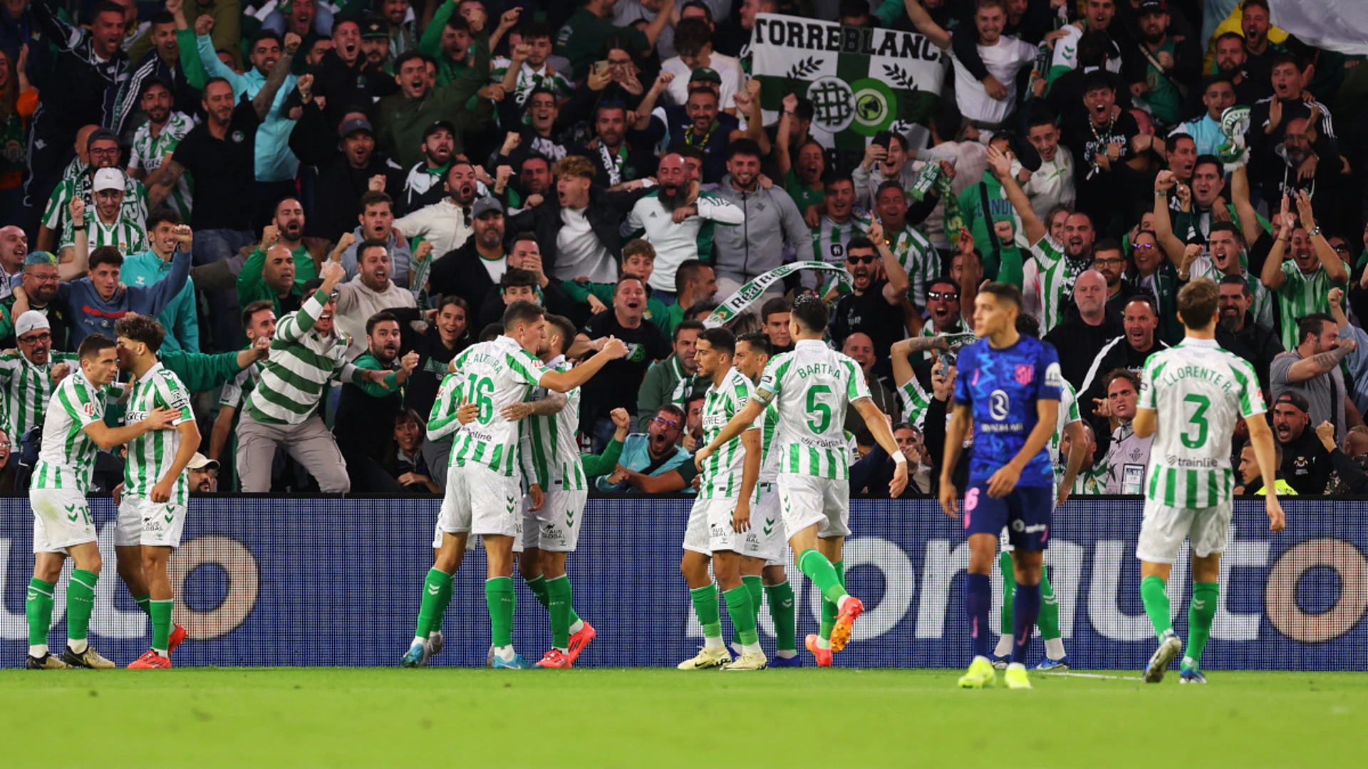 Gimenez's own goal ends Atletico's unbeaten run in defeat at Betis