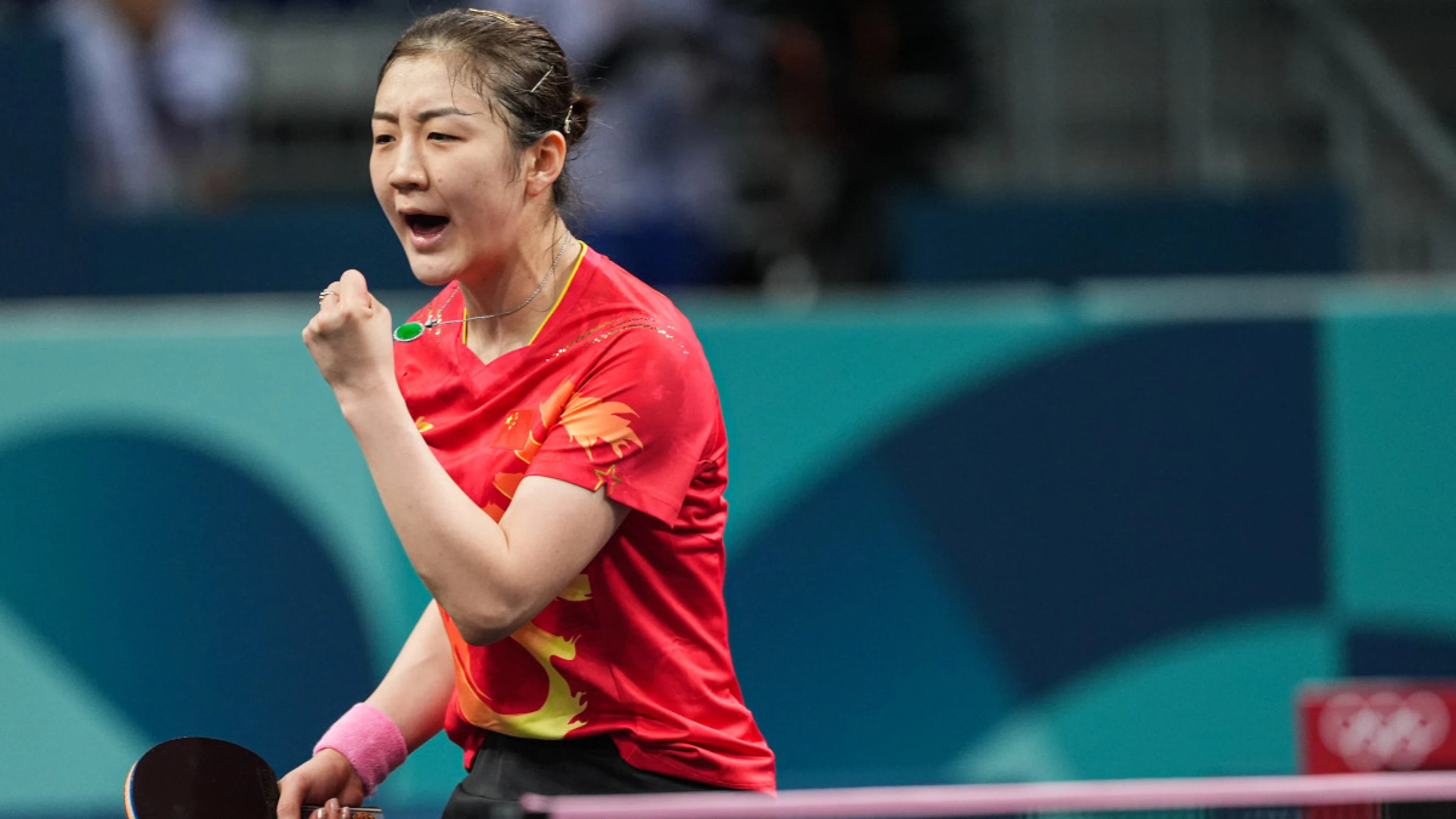 China's defending champion Chen overcomes Swedish rival, North Korean Pyon advances