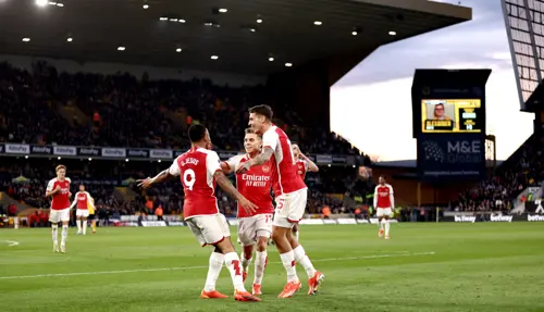 Arsenal go top of Premier League with dour win over Wolves
