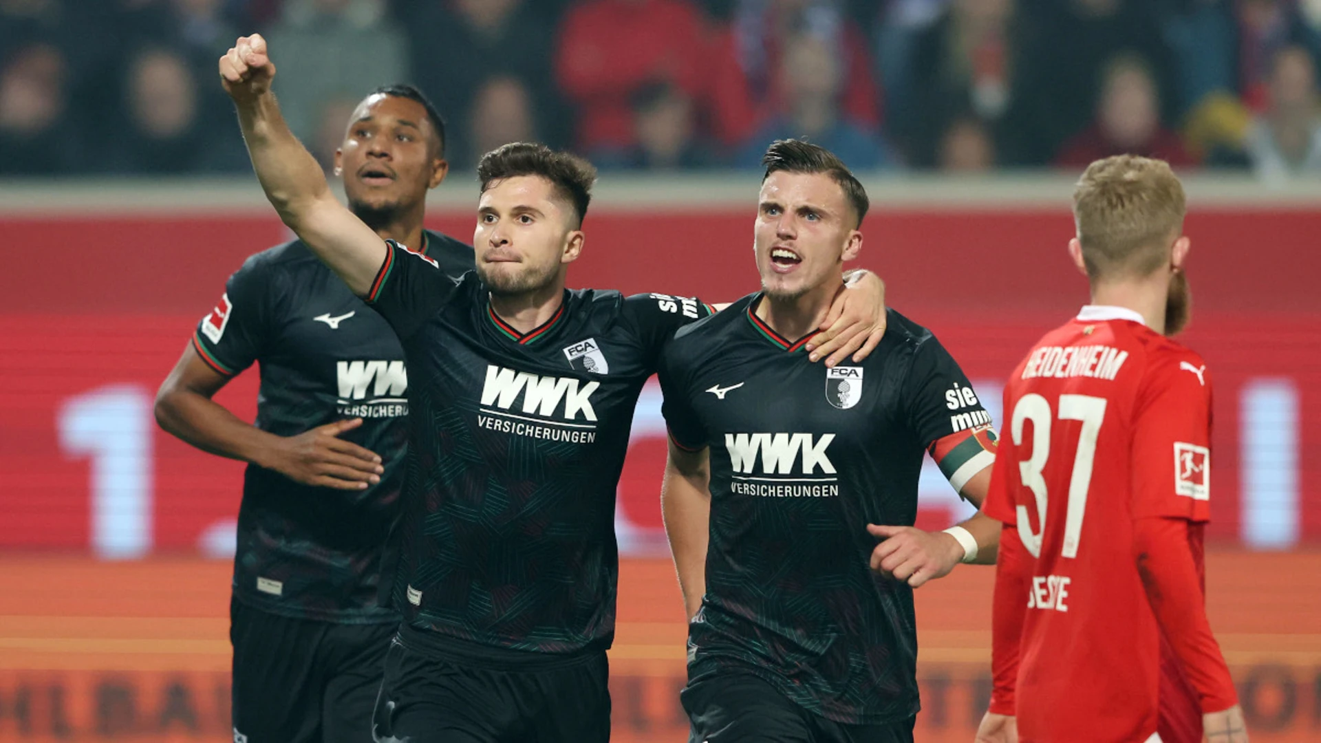 Augsburg come from two down to win seven-goal thriller at Heidenheim