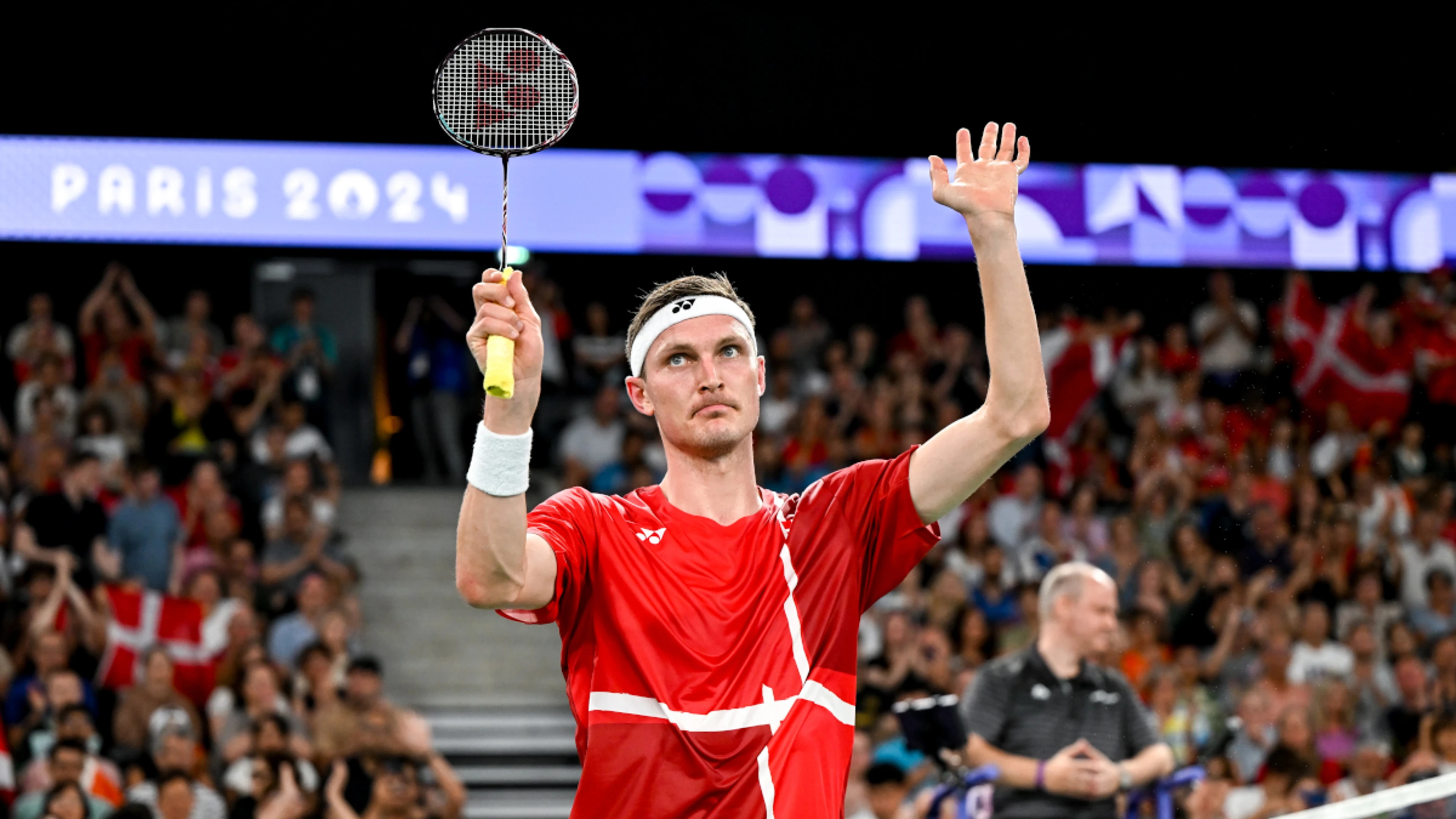 'Fresh' Axelsen, top-ranked Shi cruise into Olympic badminton quarters